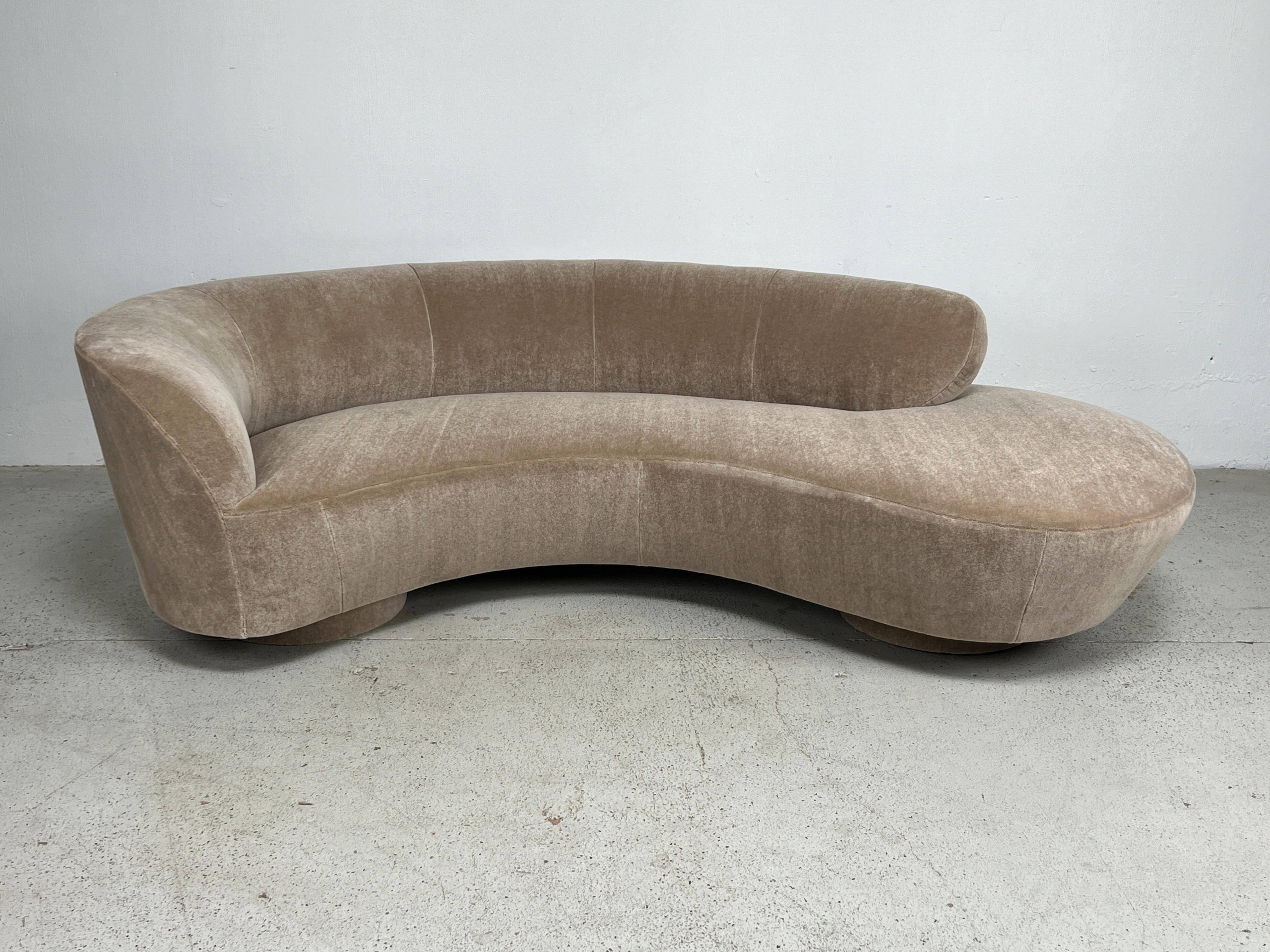 Sofa designed by Vladimir Kagan for Directional. Label to underside. Fully restored and upholstered in Holly Hunt / Fuzzy Wuzzy / Honey Bear plush mohair. 