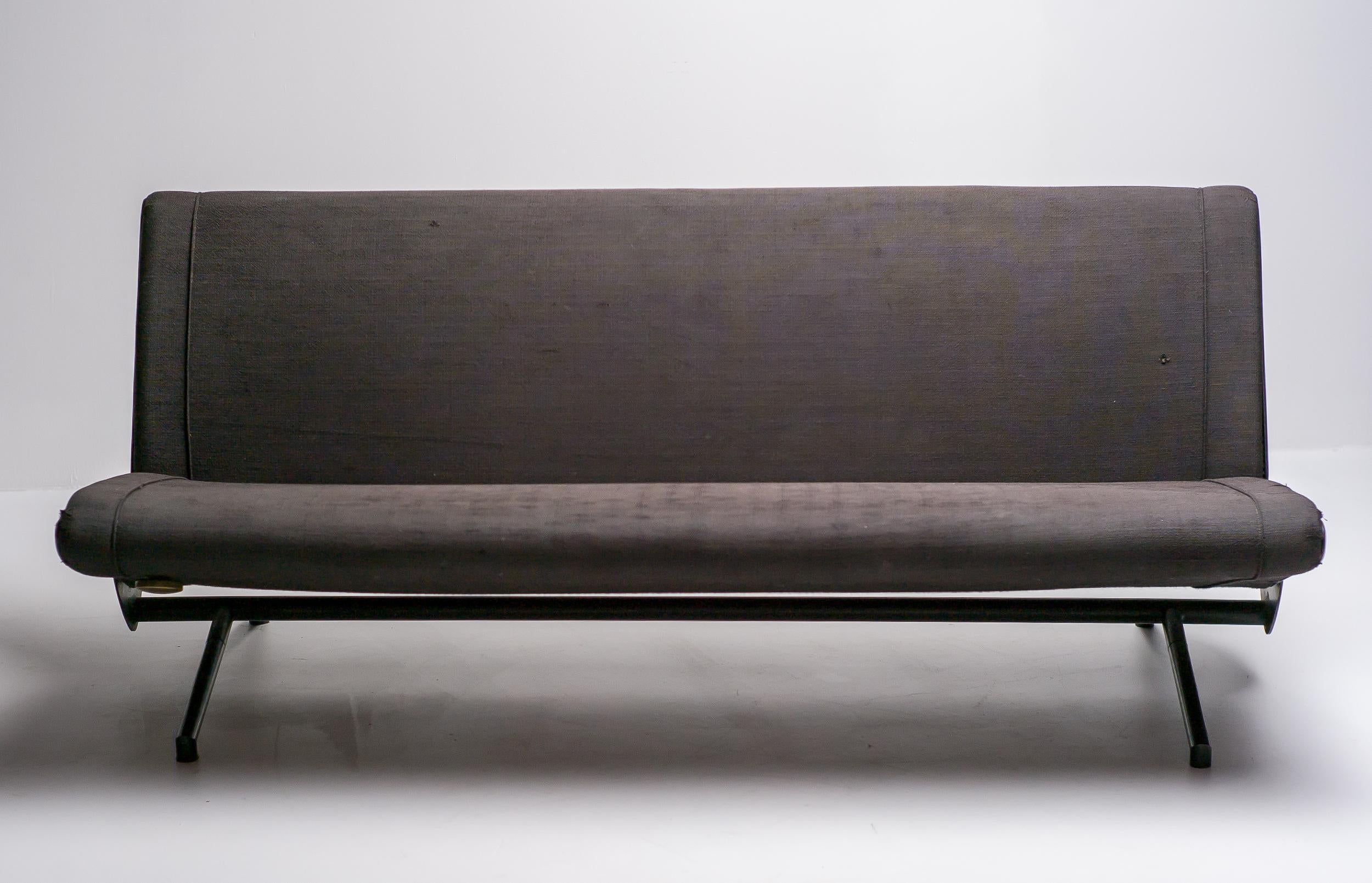 Osvaldo Borsani for Tecno sofa 'D70', enameled steel base, brass hardware, charcoal/brown fabric upholstery. 
Osvaldo Borsani's sofa 'D70' was presented at the Triennale of Milan in 1954 where it won the Gold Medal for design. Not only the design