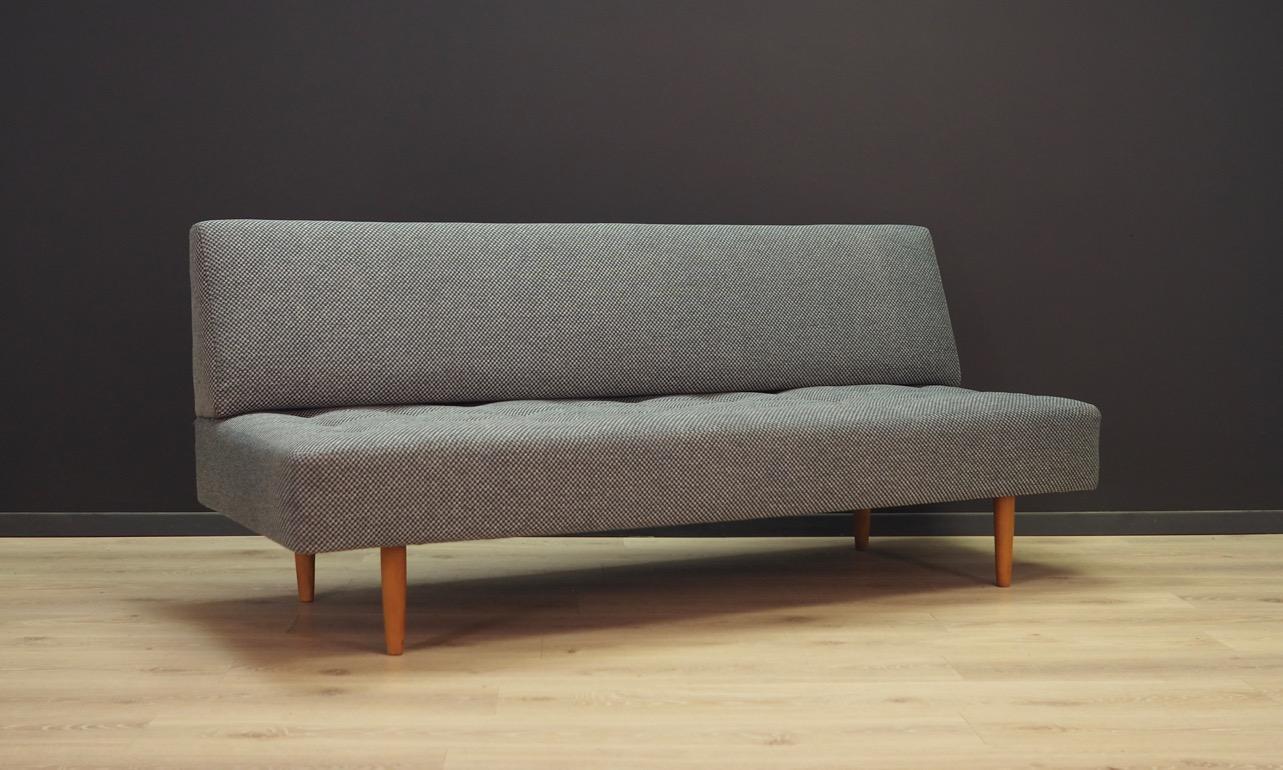 Classic wall sofa from the 1960s-1970s, minimalistic form, Danish design. Upholstery after replacement, made of grey fabric. Maintained in good condition (minor bruises and scratches), directly for use.

Dimensions: height 80 cm, width 188 cm,