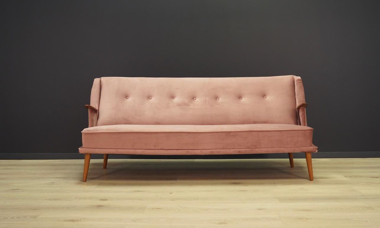 Exceptional sofa from the 1960s-1970s. Scandinavian design, Minimalist form. New upholstery made of velour in pink, teak armrests. Maintained in good condition (minor bruises and scratches), directly for use.

Dimensions: Height 80 cm, width 182