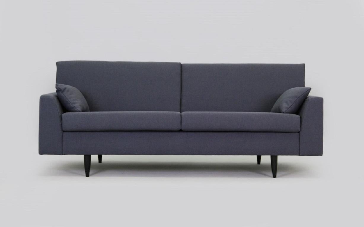 A Scandinavian sofa, Minimalist form, Danish design on neat legs. Covered with solid fabric, natural wool. New sofa.
Possibility to choose fabric color from our sampler.
Dimensions: height 74 cm, seat height 40 cm, armrests height 52 cm, length