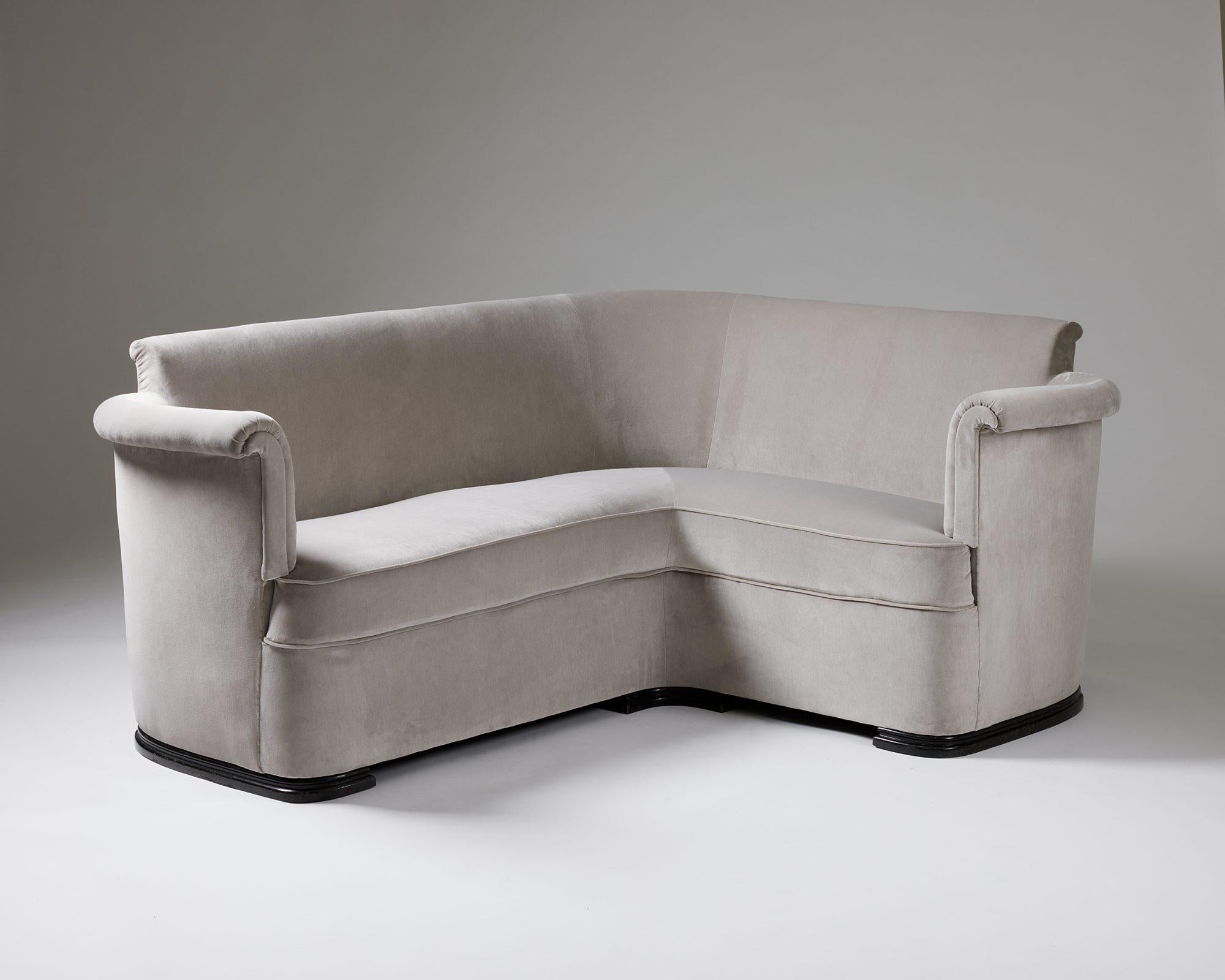 Sofa designed by Axel Einar Hjorth for Nordiska Kompaniet,
Sweden, 1930s.

Velvet Upholstery.

Dimensions: 
H: 73 cm / 2' 4 3/4''
W: 168.5 cm / 5' 6 1/4''
D: 68 cm / 2' 2 3/4''
Depth of the corner side: 136 cm / 4' 5 1/2''
SH: 43 cm /