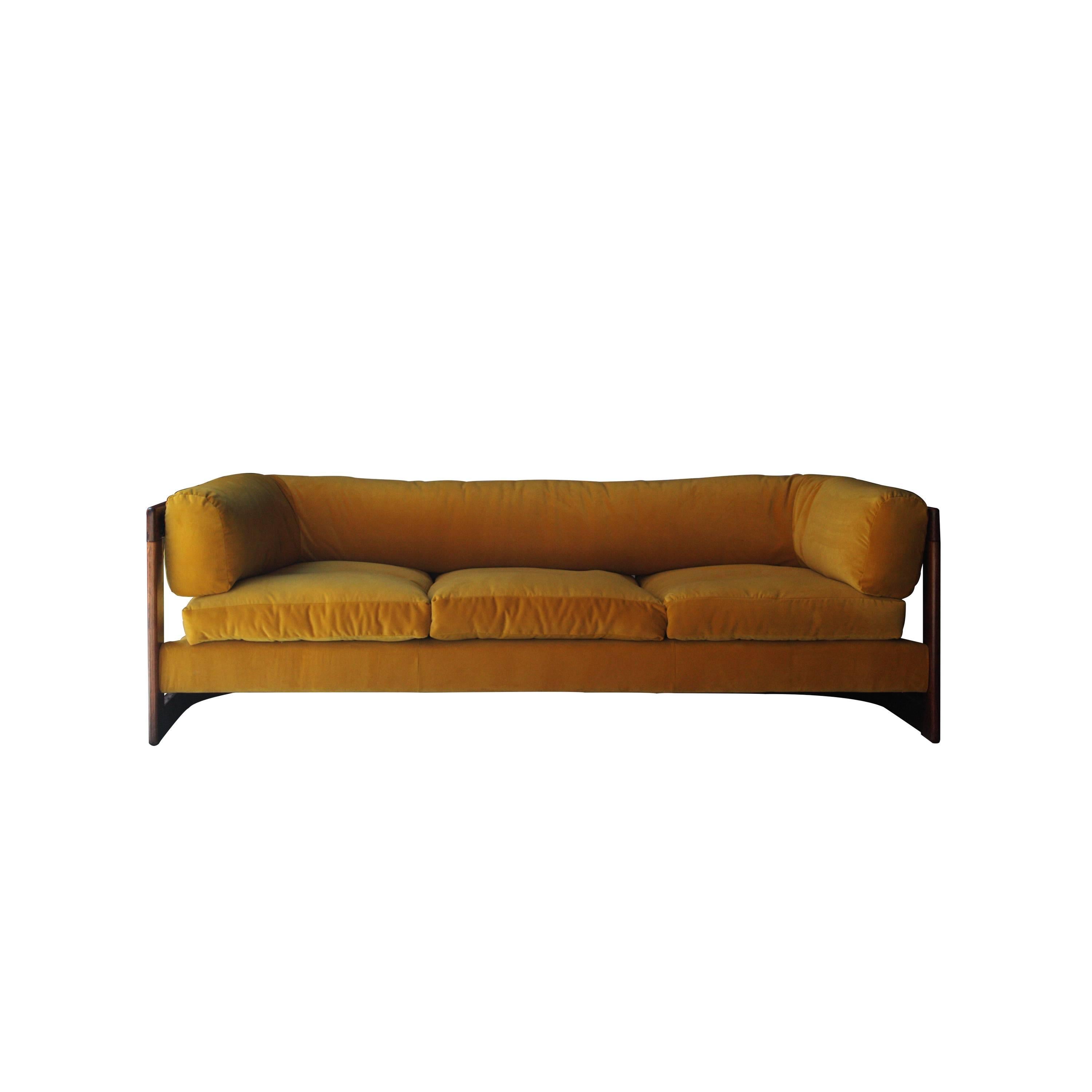 Sofa, designed by Lennart Bender and edited by Stjernmöbler, with curved rosewood structure and cotton velvet upholstery edited by India Mahdavi.
  