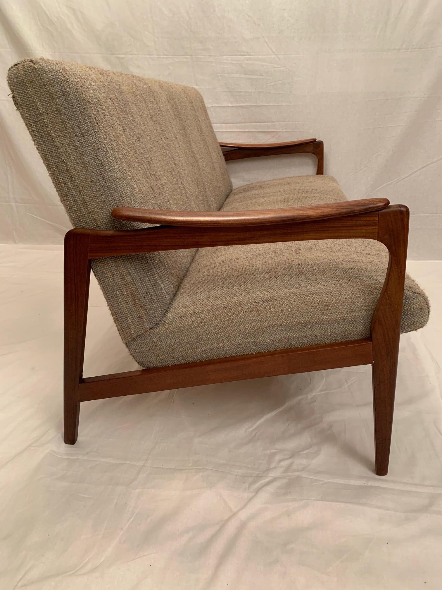Designer sofa Rolf Rastad & Adolf Relling, Dokka Mobler from the 1960s fully original, without renovation. Joinery made from rosewood. The sofa is in very good condition, after professional upholstery. Attractive, classic form.