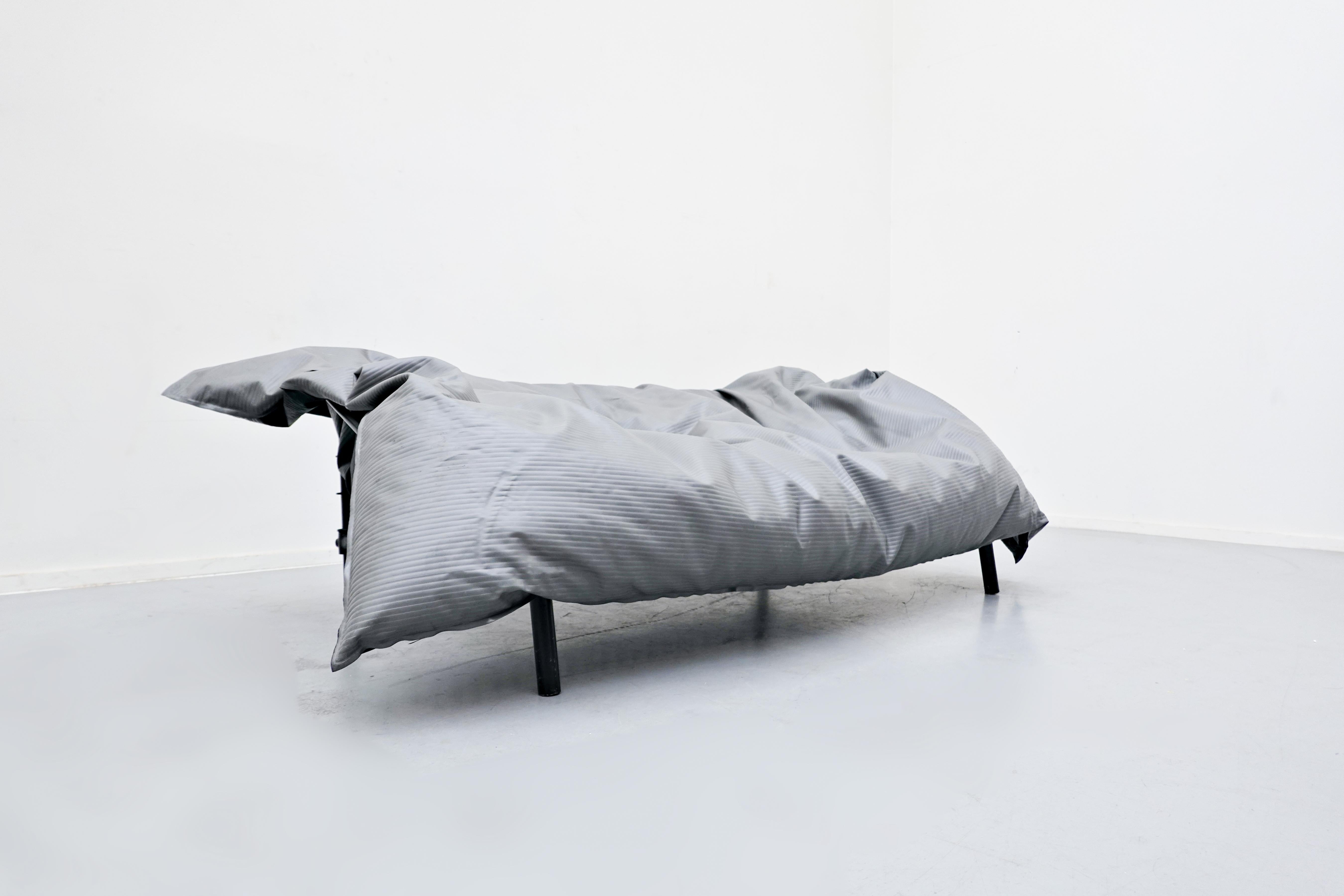 Rare sofa designed by Ron Arad for One/Off, United Kingdom, 1985

Steel structure and PVC seating cushion filled with unexpanded polystyrene granules.


