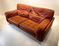 Divano in pelle cognac di Roche Bobois