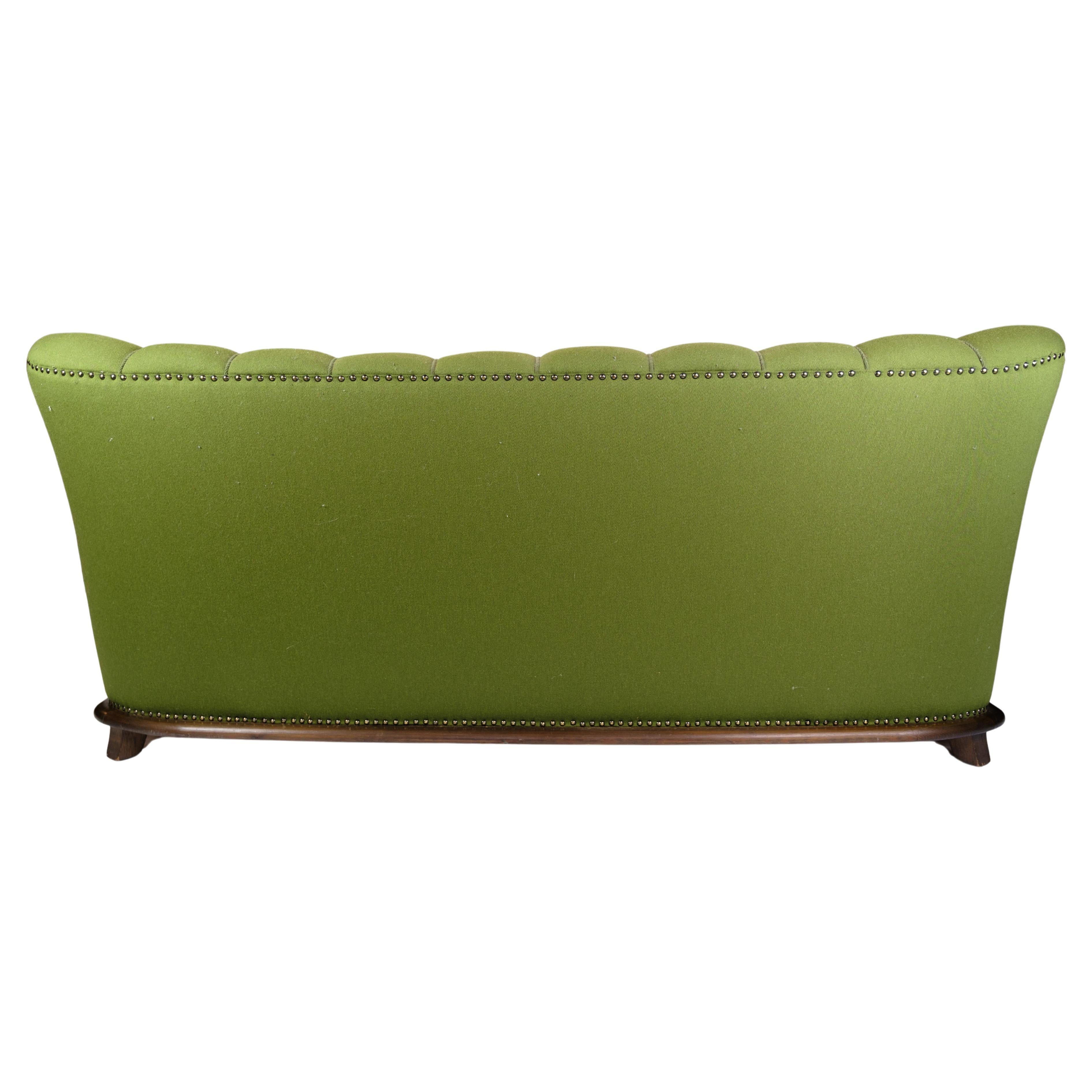 Sofa in Green fabric with Wood Carvings from 1920s. 3