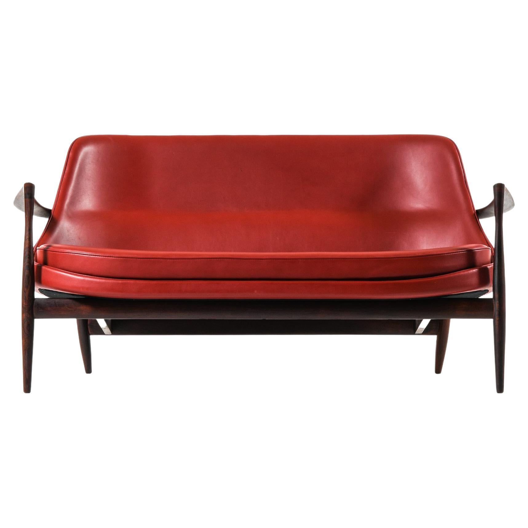 Sofa in Rosewood and Reupholstered in Burgundy Leather by Ib Kofod-Larsen, 1956 For Sale