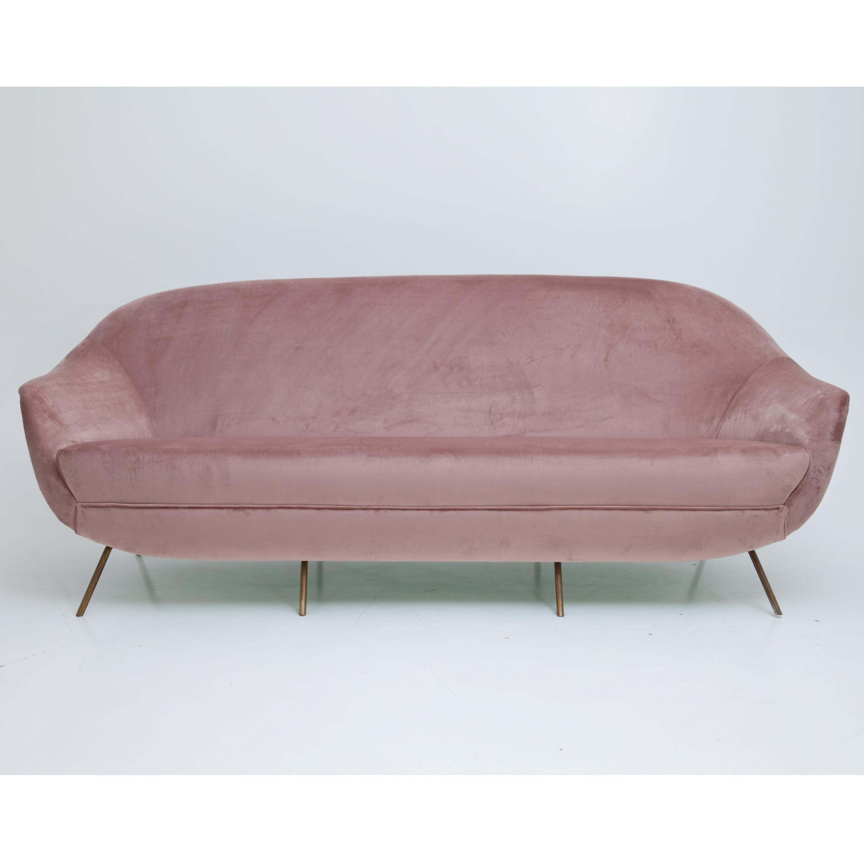 Three-seat sofa on brass legs. The sofa was newly upholstered with a high-quality fabric in a soft rose color and grey.
        