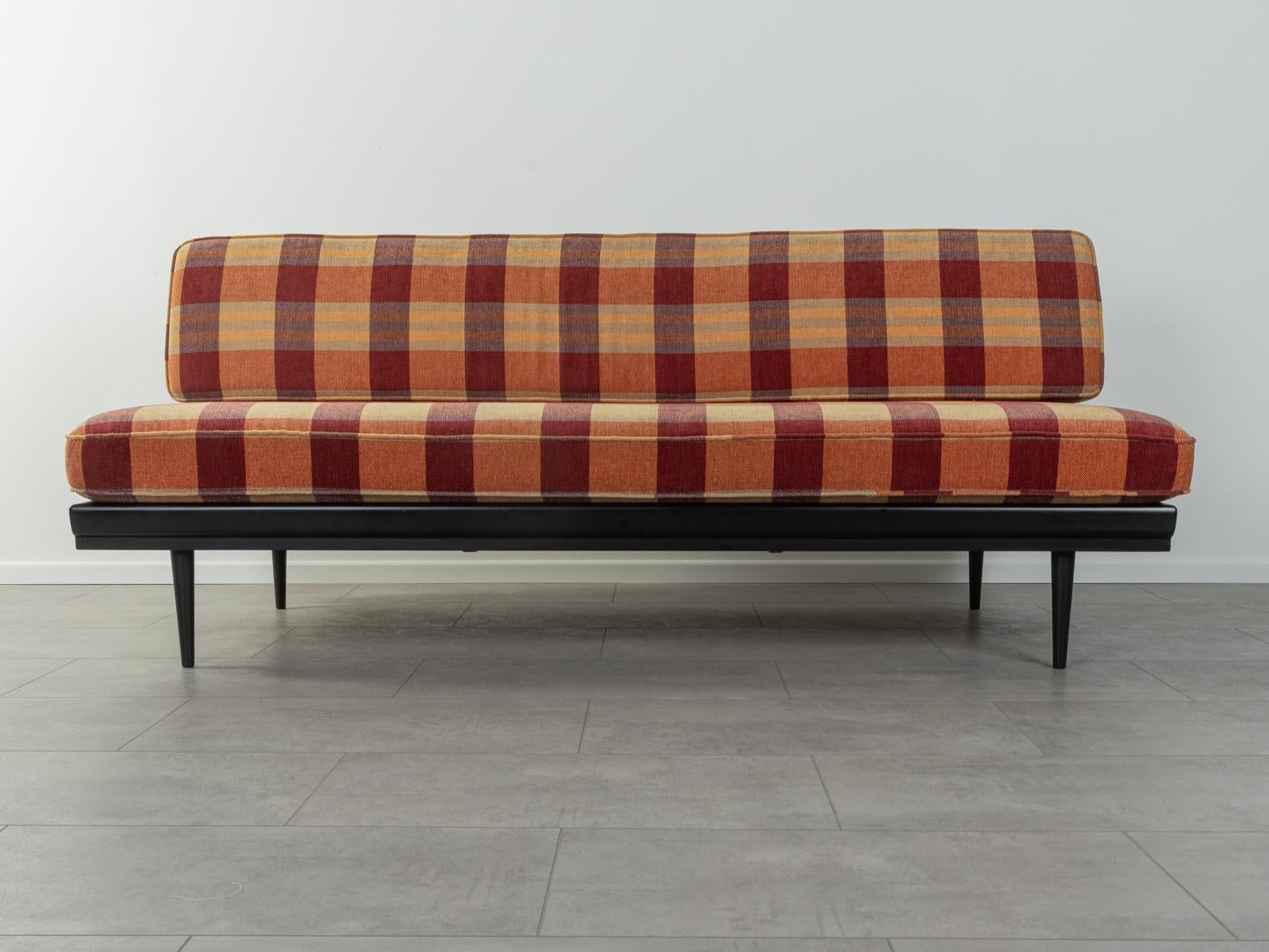 Wonderful sofa from the 1950s, solid frame in black lacquered cherry wood. The sofa has been newly upholstered by the previous owner and covered with a new high-quality upholstery fabric. The upholstery was professionally cleaned by