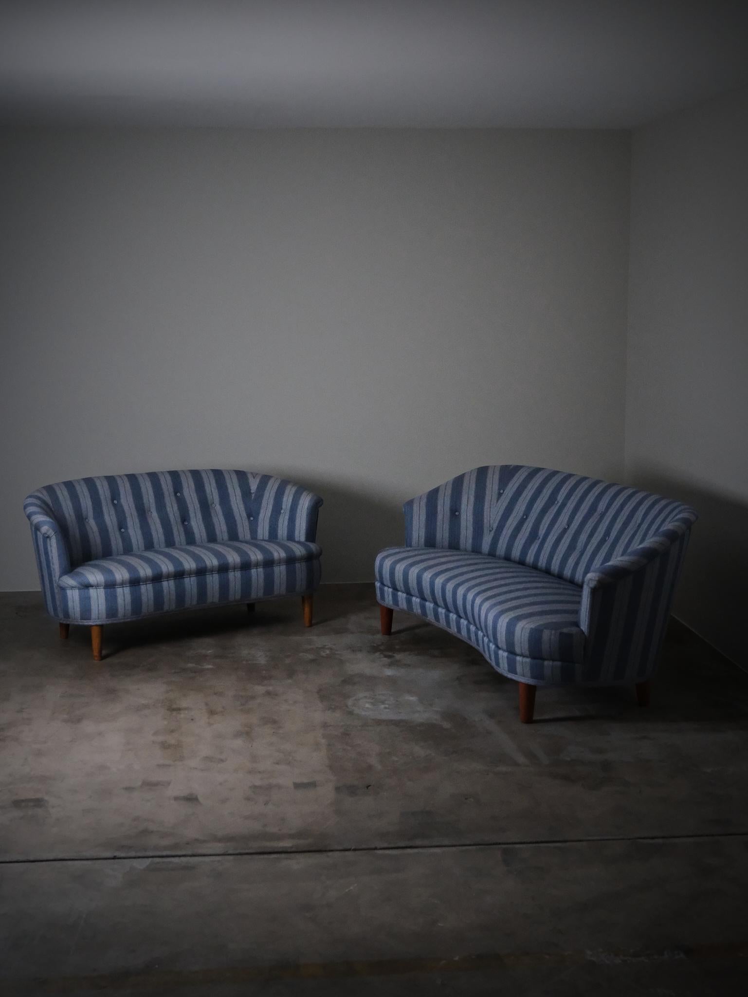 Elegant sofa designed by Carl Malmsten in Sweden during the 1940s. 