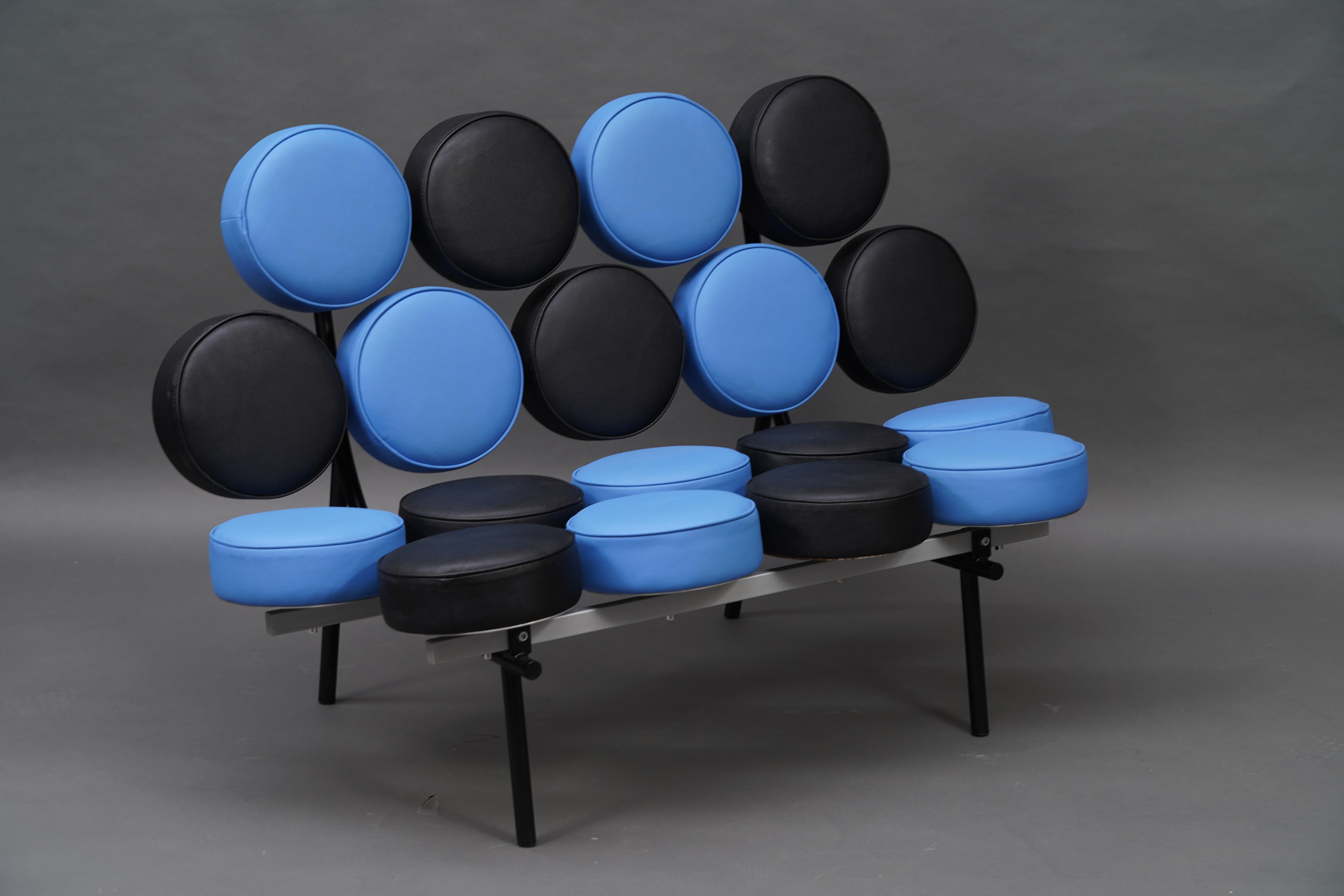 An icon of post-war design, the Marshmallow sofa represents an optimistic and heroic moment in American history. This unique sofa has a very recognizable design with 18 round, separate cushions that are held together by a chrome and black metal