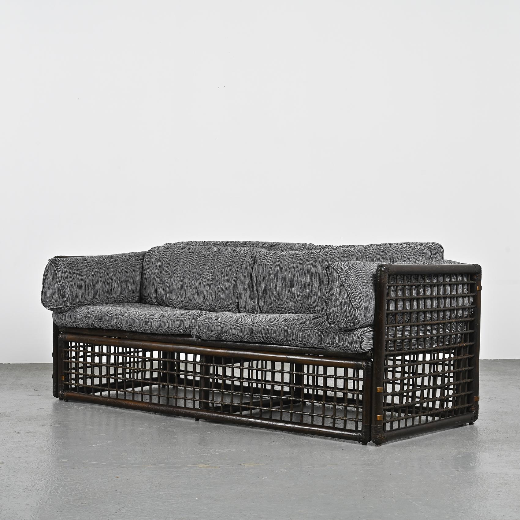 In 1975, Afra & Tobia Scarpa's Basilan 1 sofa debuted, a design gem by B&B Italia, celebrating Italian craftsmanship. This collection reflects the duo's creative brilliance and commitment to timeless design, and is a unique and iconic part of rattan