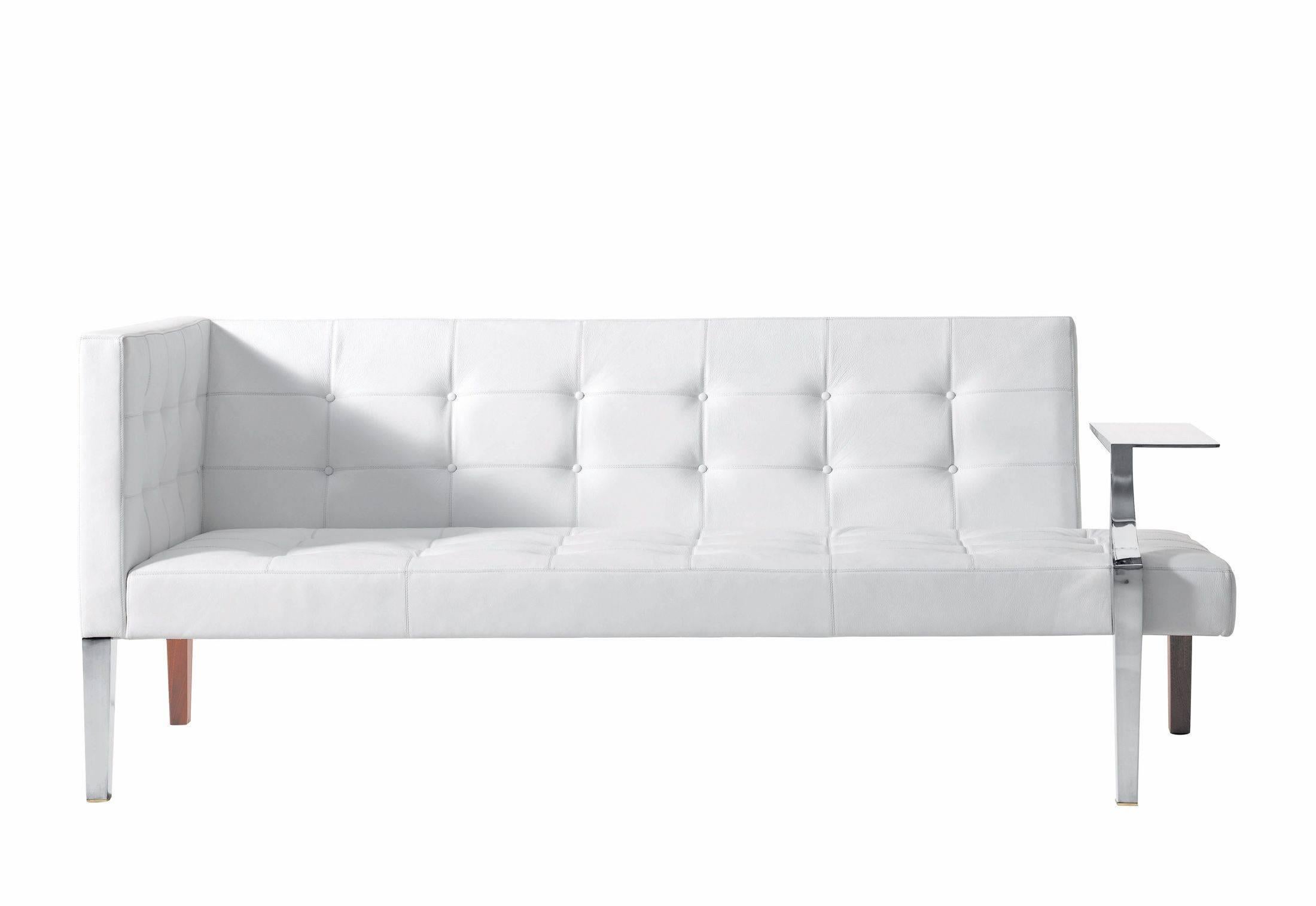 Sofa Monseigneur designed by Philippe Starck for Driade Italy. Structure with front legs/armrest in stainless steel casting and back legs in mahogany wood, seat and back in polyurethane foams with fixed cover in quilted white leather.