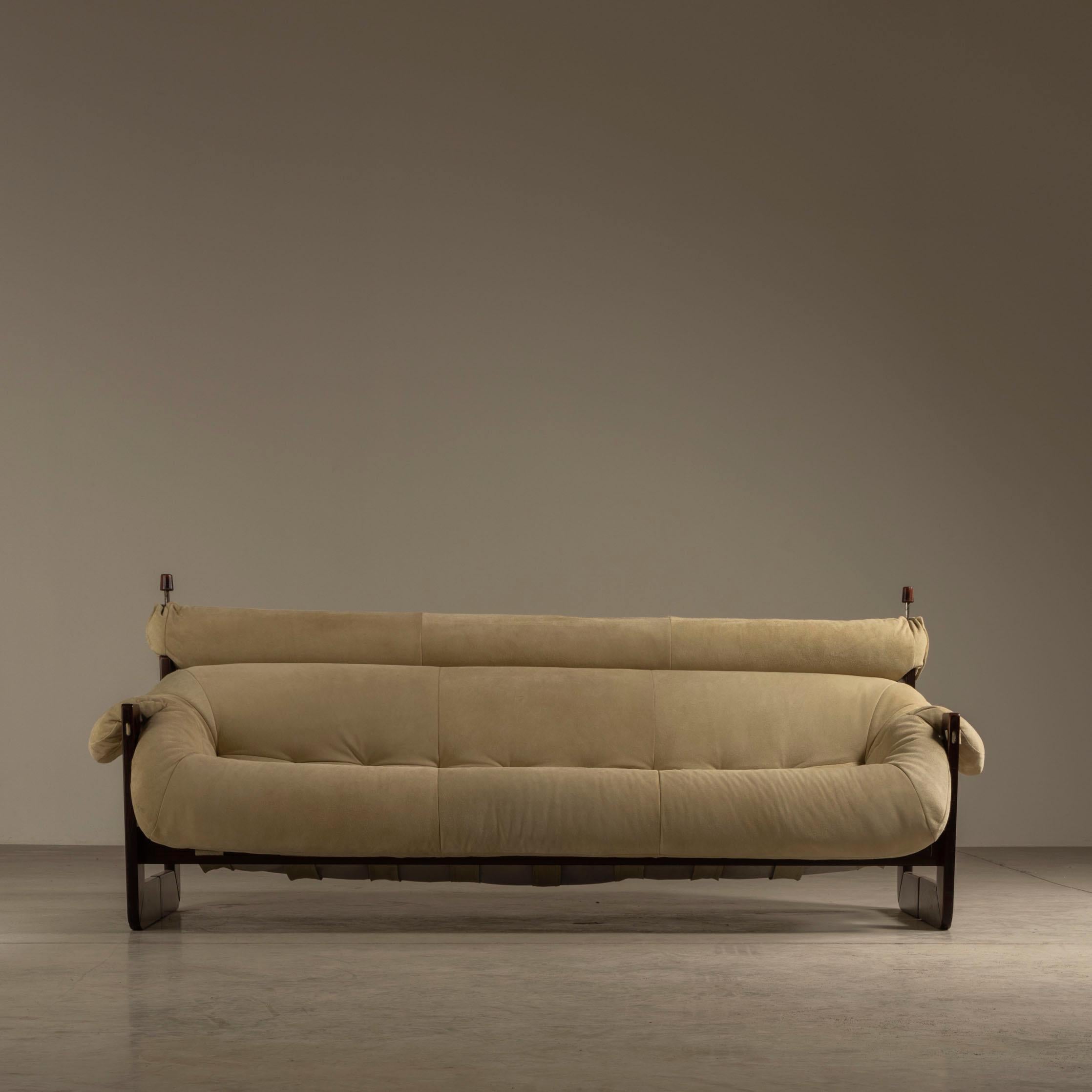 The MP-97 sofa by Percival Lafer is a stunning piece that showcases the designer's imaginative and innovative mind. The frame is made of Jatobá wood, and the seat and backrest are made of a single injected foam, which creates a comfortable seating