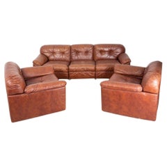 Sofa Set and Pair of Vintage Armchairs from the 80s in Leather Sormani Design
