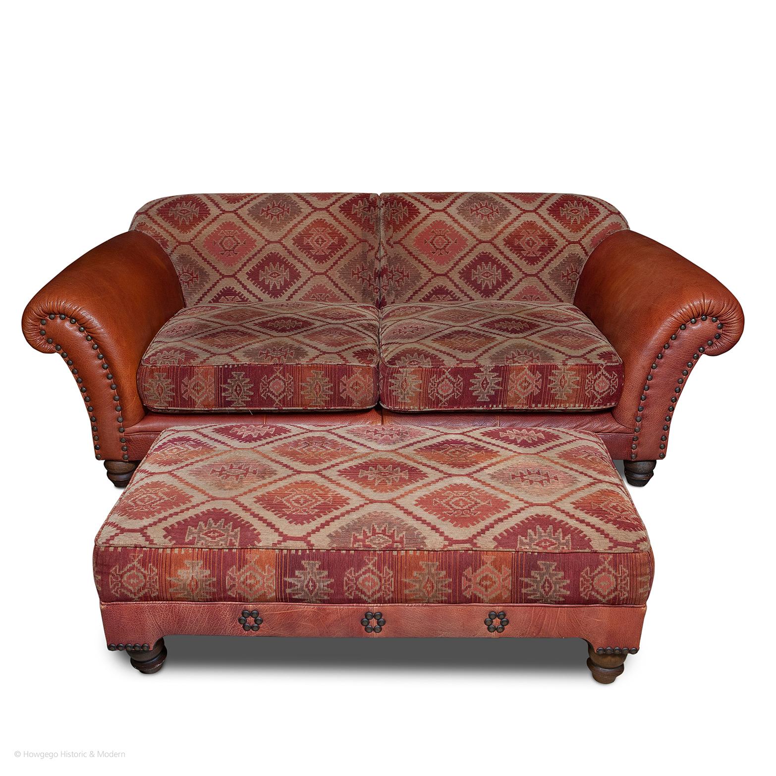 Vintage leatherette and kelim upholstered country house style armchair

- Classic country house or club suite
- Striking, casual, aesthetic mingling hard-wearing, kelim and leather upholstery, child and pet proof
- Elegant with bun turned