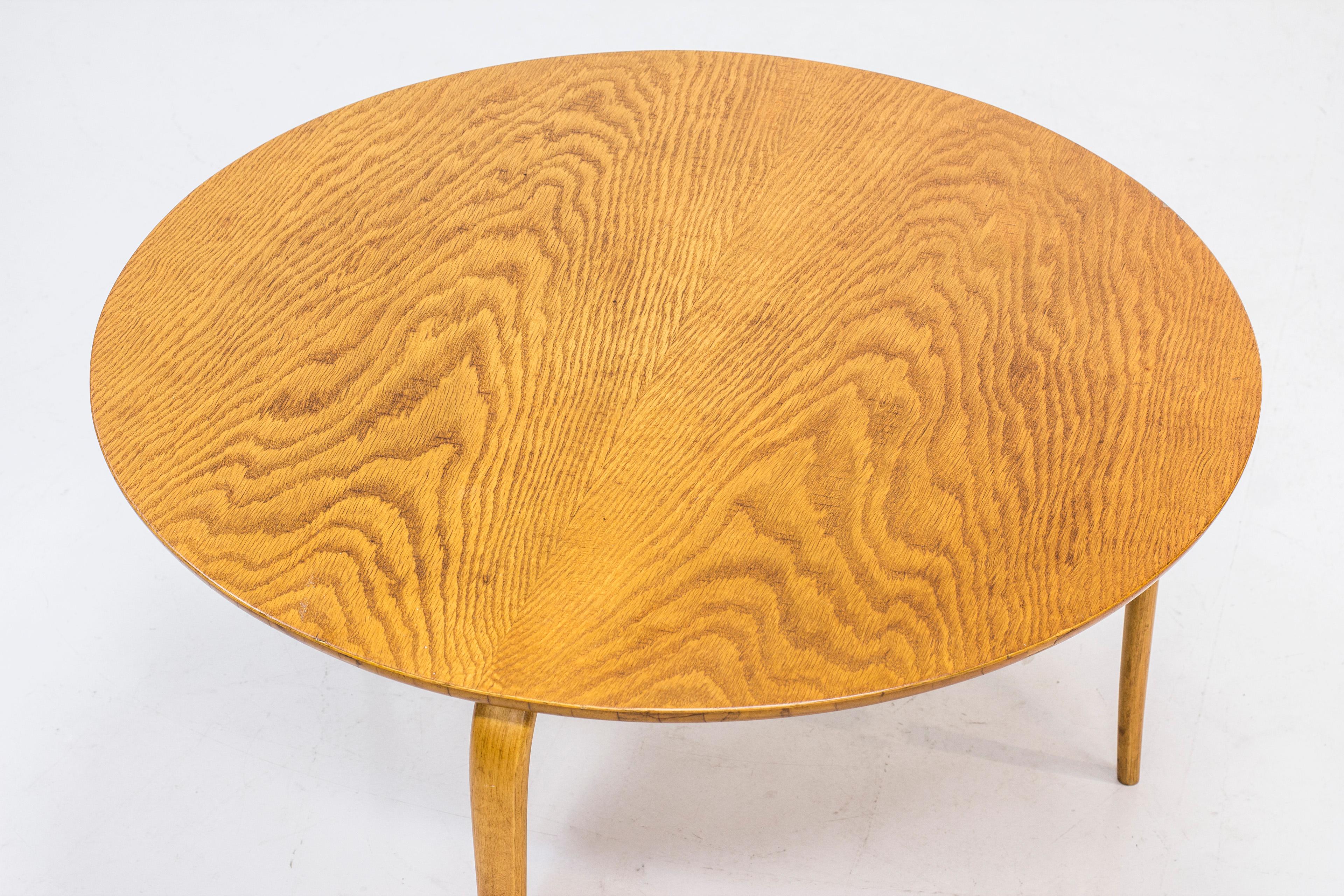 Occasional table model “Annika” by Bruno Mathsson for Karl Mathsson, Sweden. Designed in 1936, this example made during the late 1930s or early 1940s. Legs made from steam bent birch and tabletop in oak. Good vintage condition with age related marks