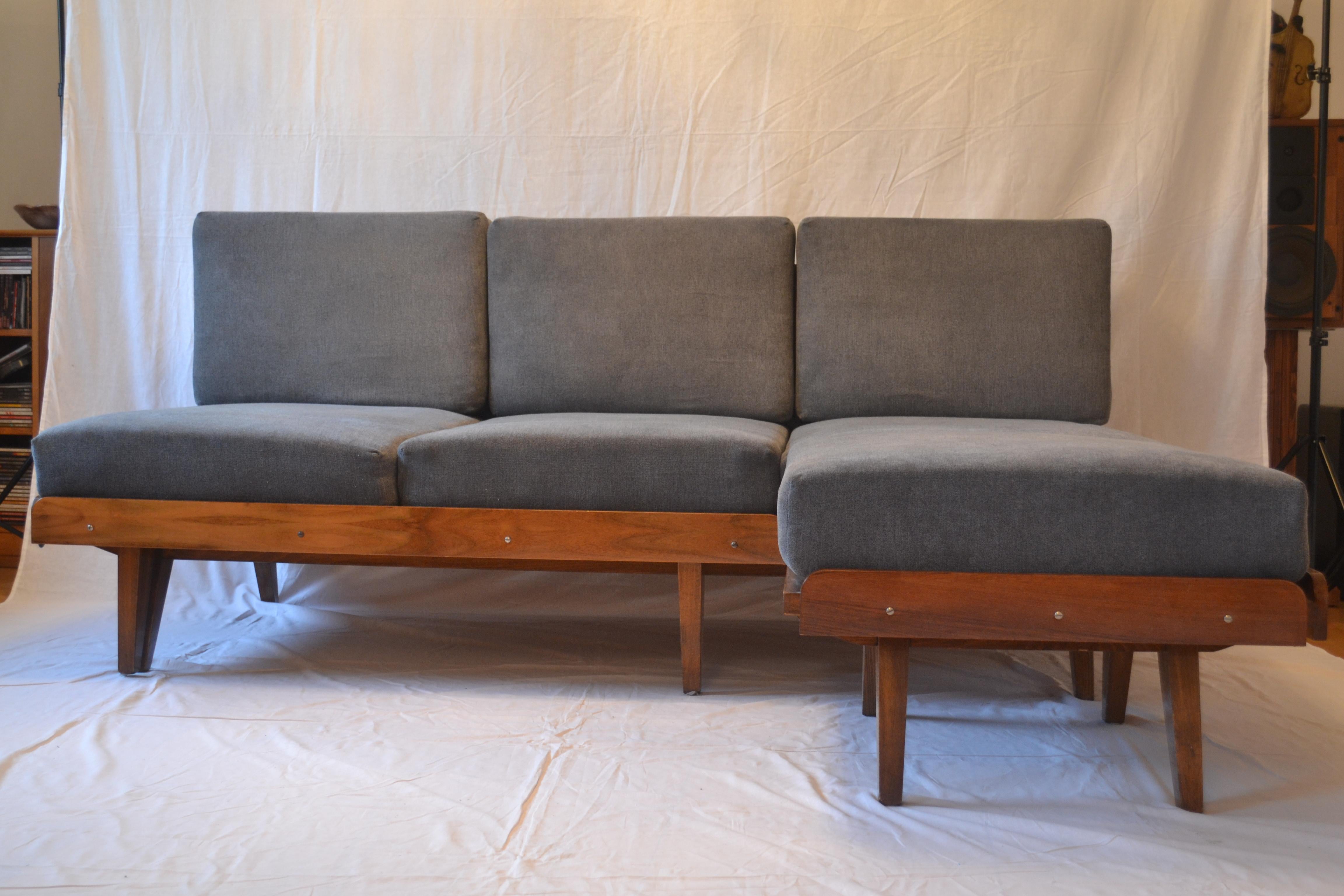 Czechoslovak sofa Tatra Nabytok from 1965. Original with new upholstery. The sofa has a sleeping function and when measured, measures 155 cm. The wide footrest definitely improves the comfort of using the sofa. Classic, cool form and excellent