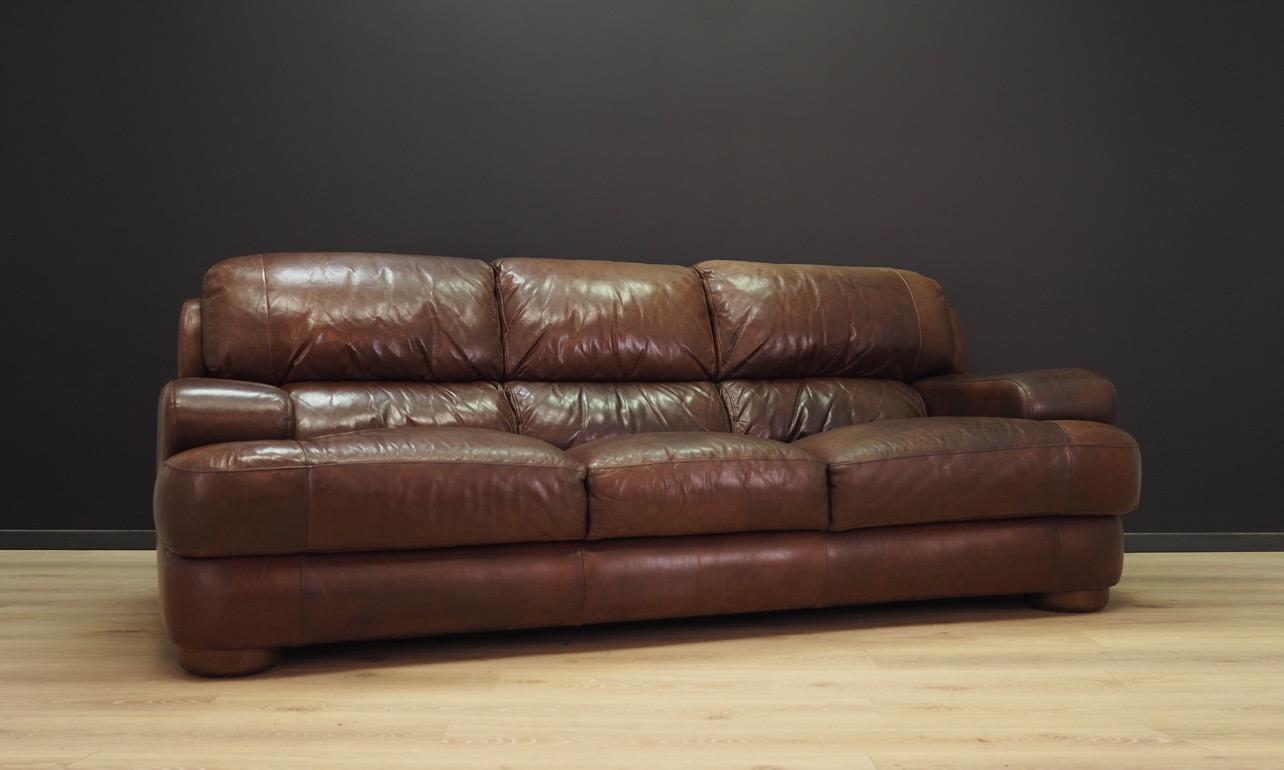 Phenomenal sofa from the 1960s-1970s, Scandinavian design. Upholstery made of original leather in brown color. Maintained in good condition (minor bruises and scratches), directly for use.

Dimensions: height 90 cm x width 235 cm x depth 105 cm