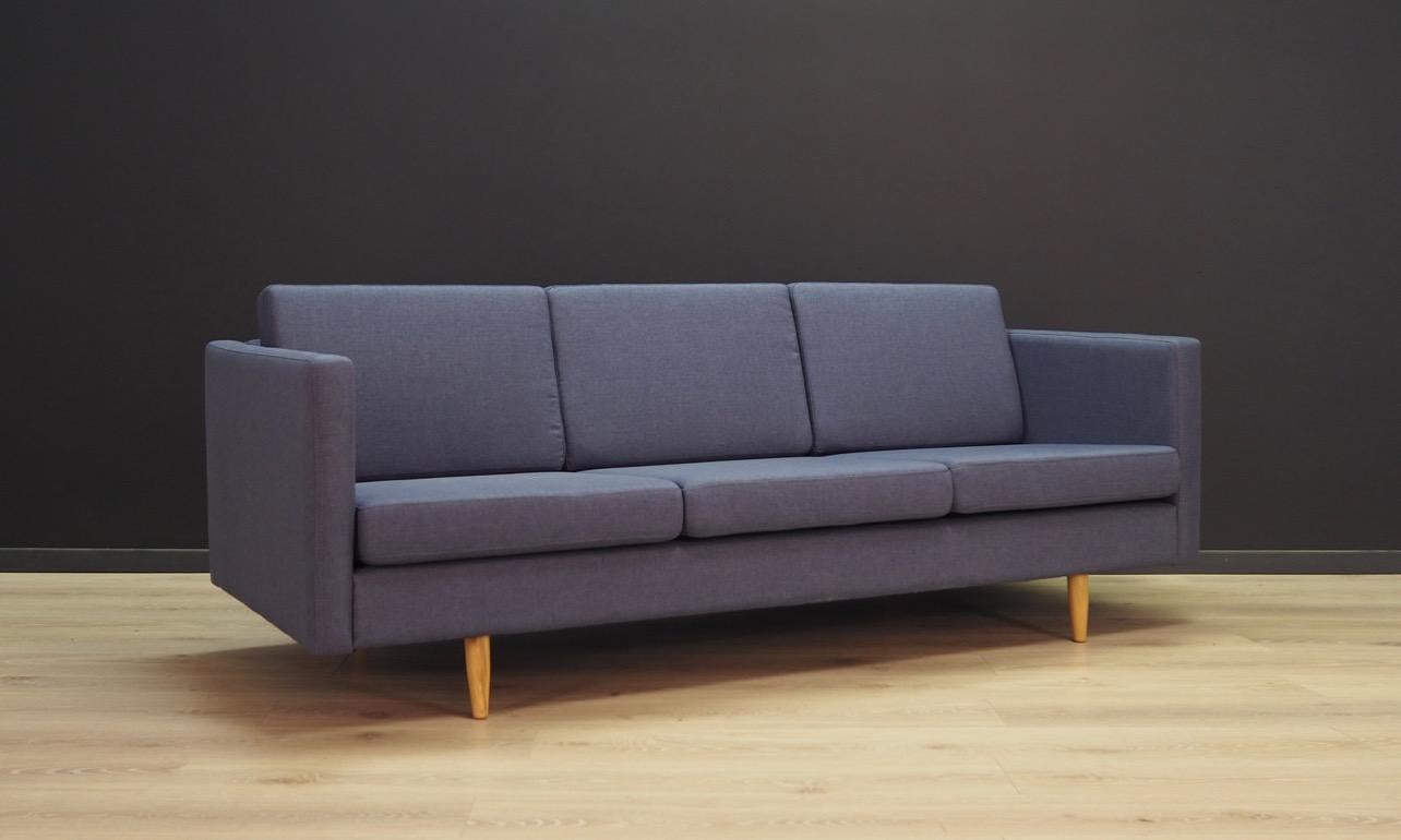 Fantastic sofa from the1960s-1970s, minimalistic form, Scandinavian design. Three seated sofa with new upholstery in blue. Maintained in good condition (minor bruises and scratches) - directly for use.

Dimensions: height 74 cm width 195 cm depth