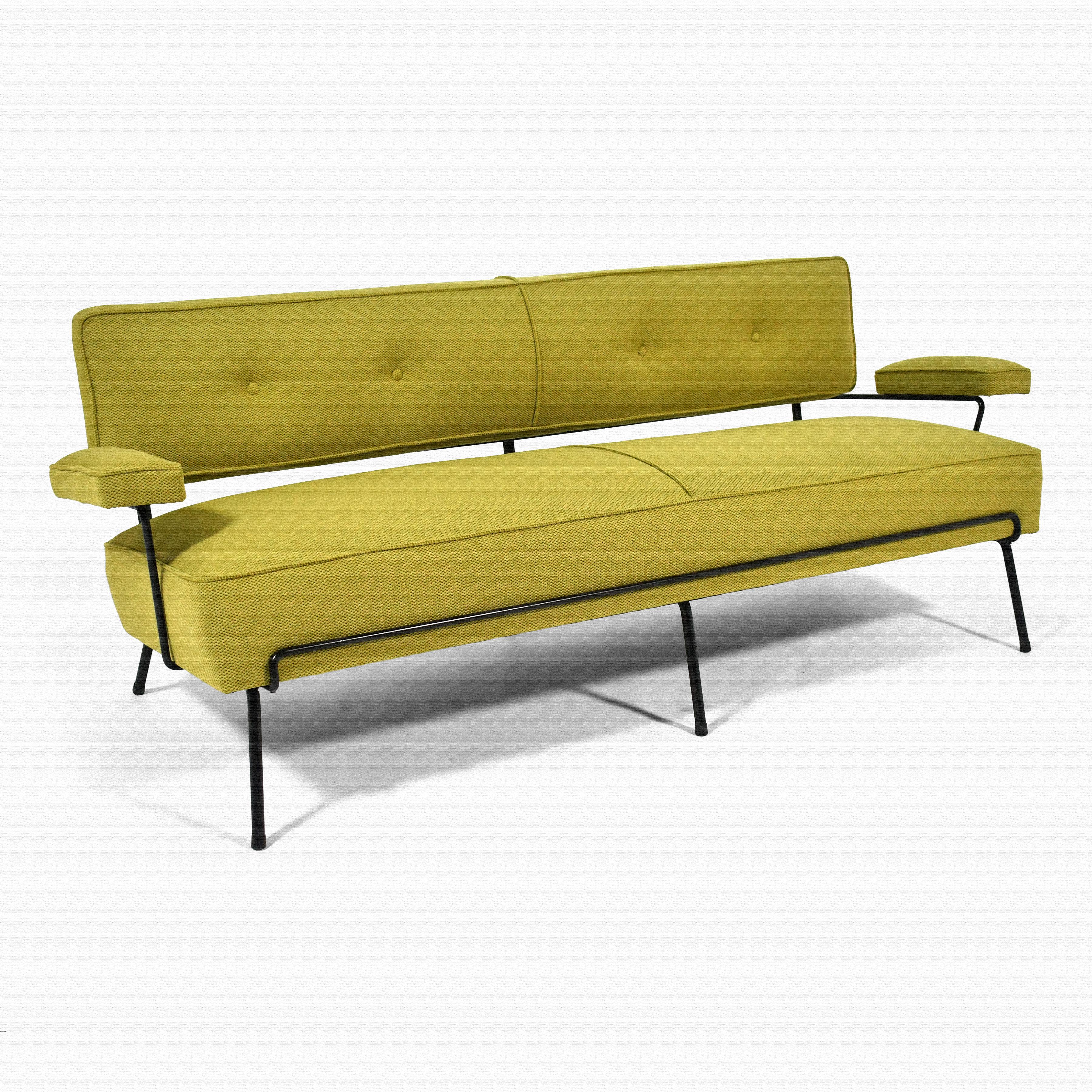 This terrific sofa  with it's floating back and arms attached to the iron frame is classic  post-war design. Attributed to William Armbruster for Edgewood Furniture.  A well built piece with terrific heft, it is entirely original and is just waiting