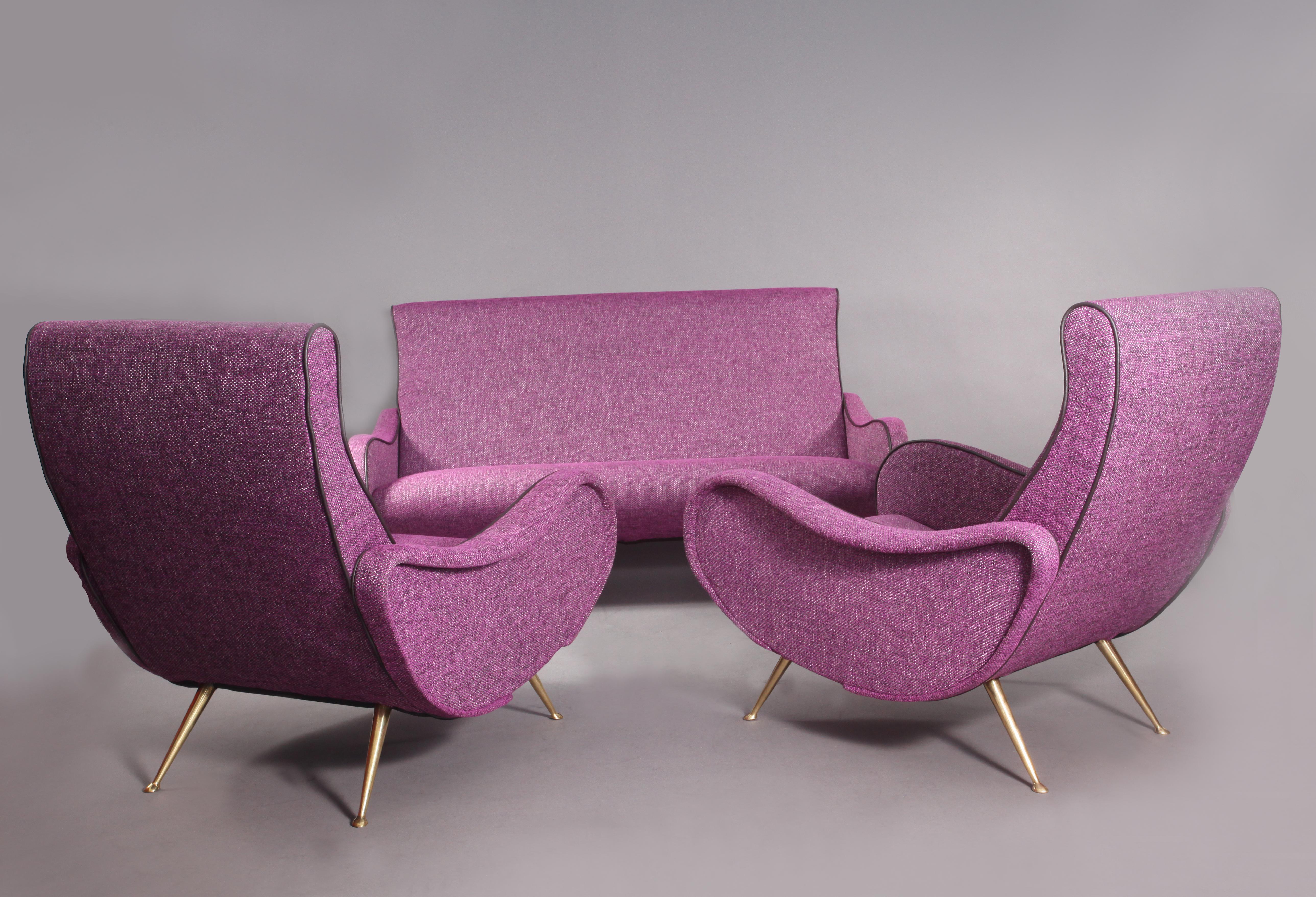 Two lady chairs with two-seat sofa
Marco Zanuso style 
Italy, 1950
purple fabric, brass legs
Measures: sofa: widht 151cm
 depht 80cm
 height 91cm.
 