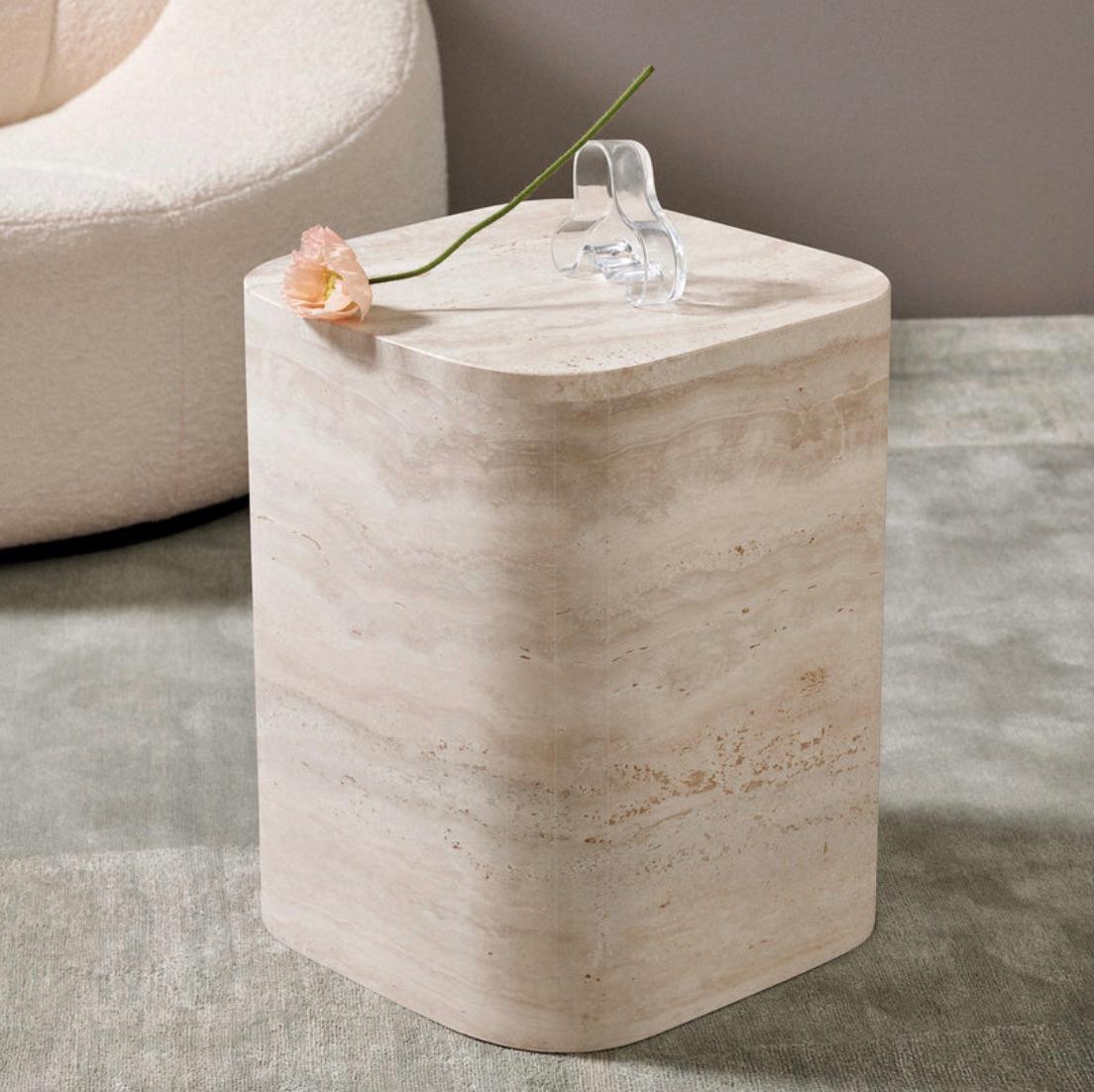 Sofia Side Table designed by Just Adele.

An occasional table, designed with soft curved edges allowing the natural veins in travertine to shine. Each piece is hollow with seamless edges. Can be paired with The Sofia Coffee Table.

Each piece is