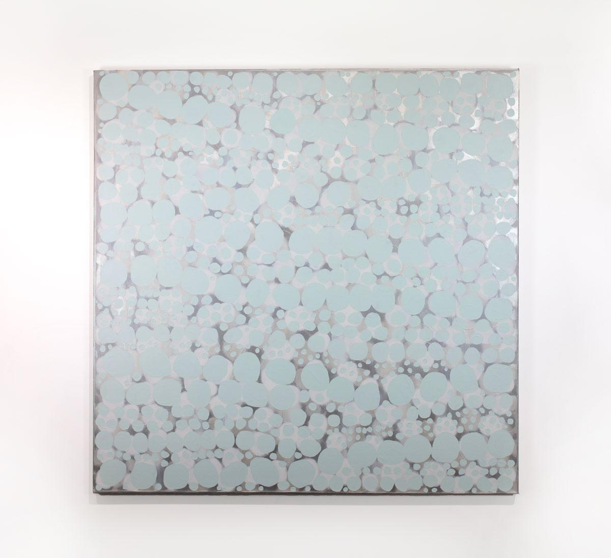 This large abstract statement painting by Sofie Swann features a light grey palette with subtle metallic silver accents, and imperfect circular forms arranged in a pattern throughout the composition. This painting is made on gallery wrapped canvas