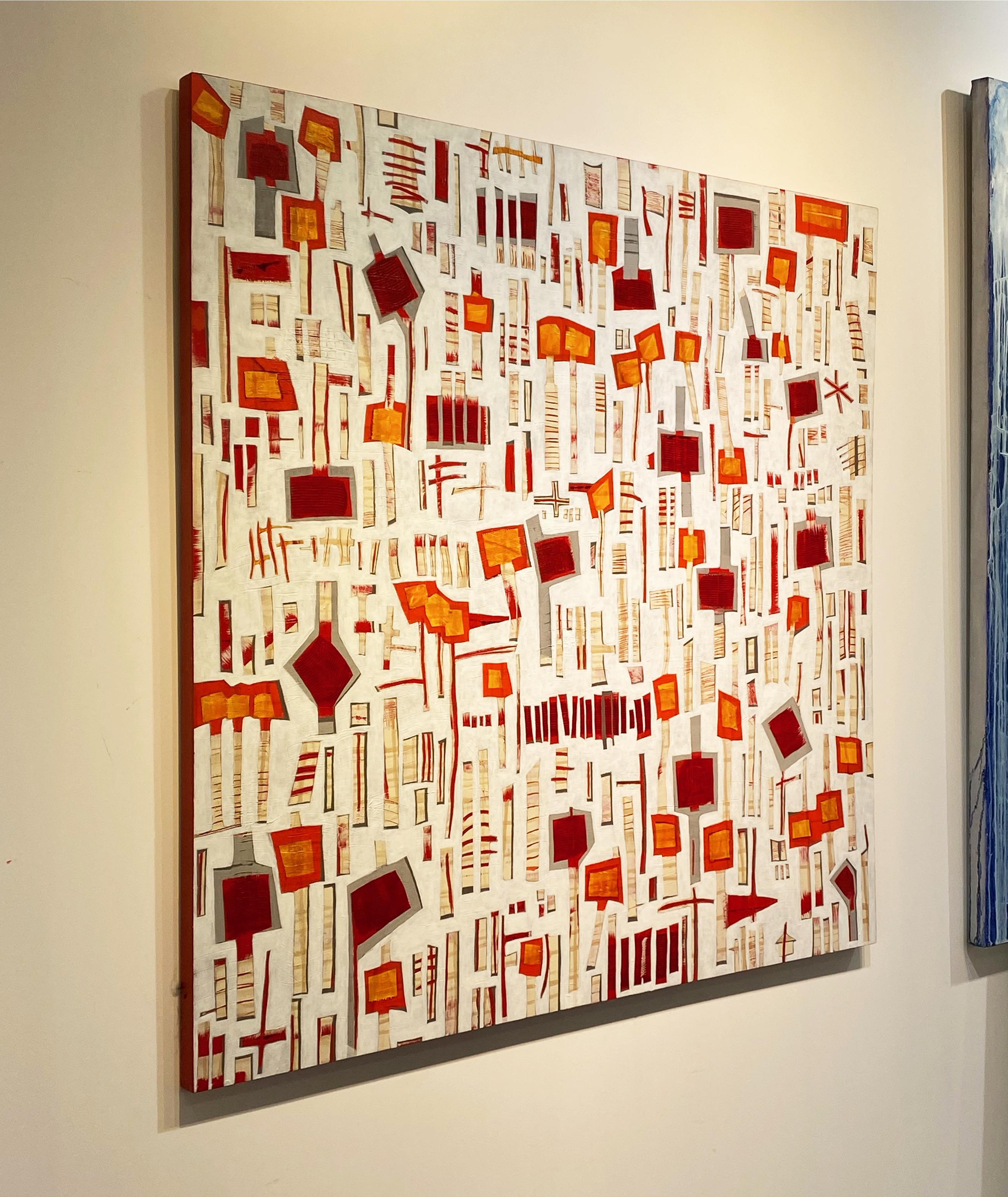 This large abstract painting features a neutral but warm palette. Red, orange, and creme-colored rectangular shapes which are striped, with larger square-like shapes that top several of the vertical rectangles, giving the appearance of a very