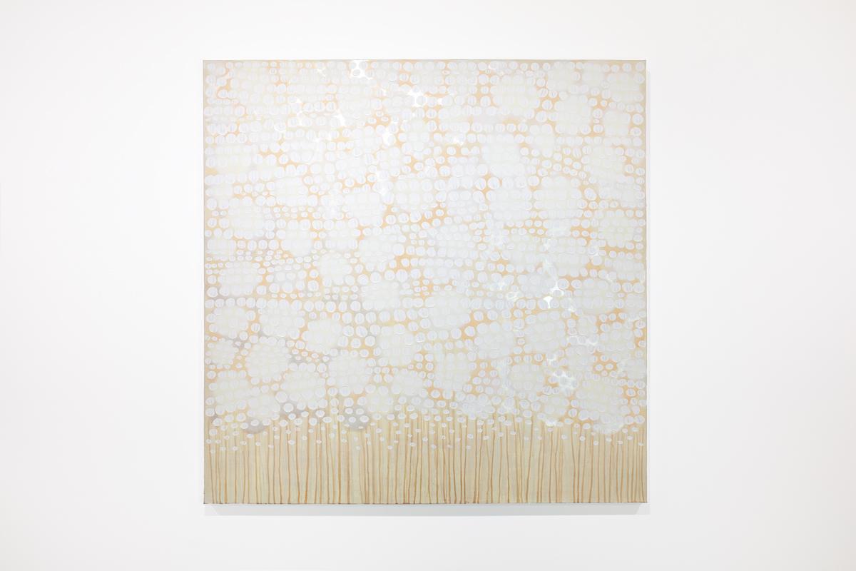 This abstract painting by Sofie Swann features a warm neutral palette, layering imperfect white and sandy beige circular and linear shapes over top of one another to create an abstract composition. The sides of the gallery wrapped canvas are