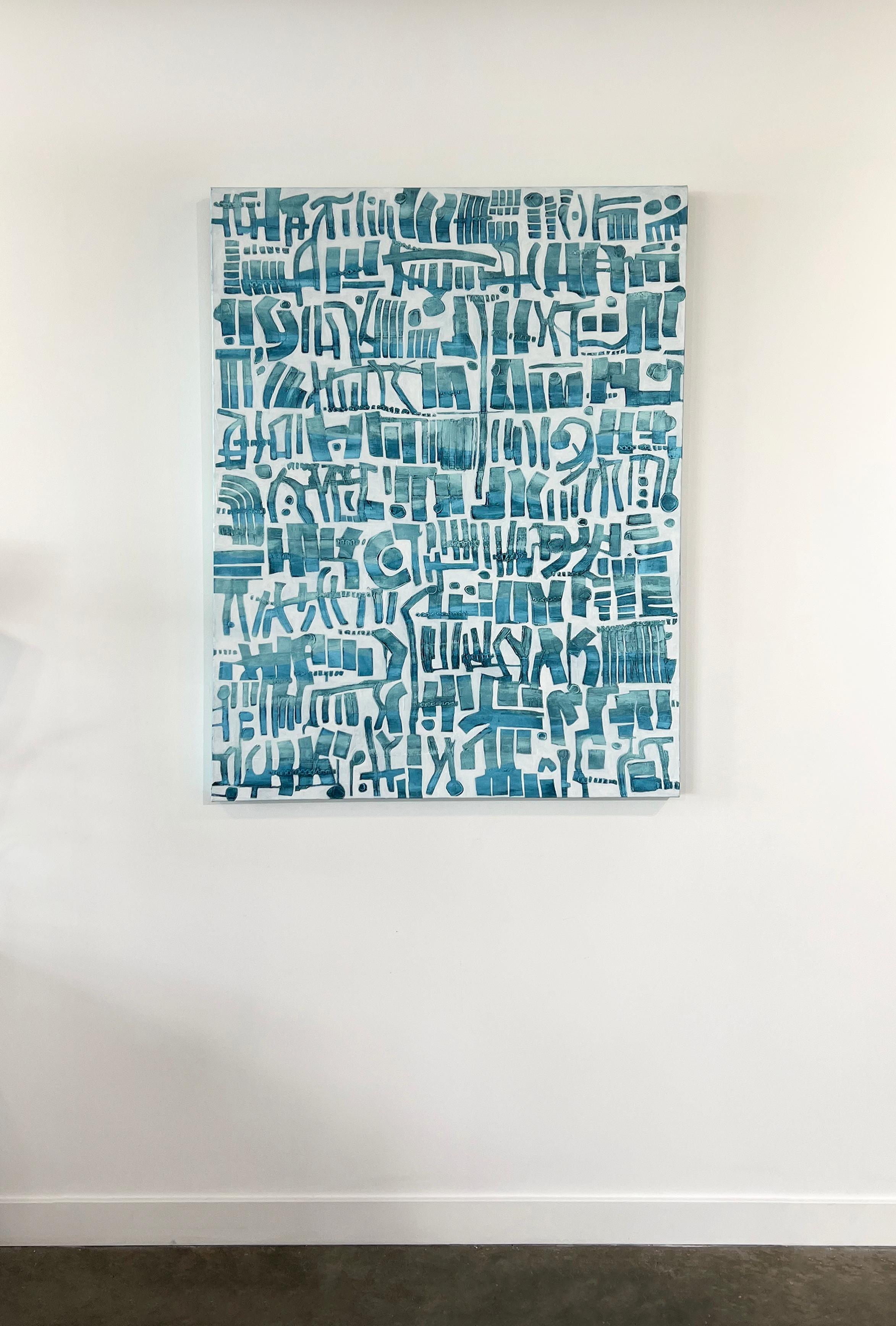 This large abstract painting by Sofie Swann is made with acrylic paint on gallery-wrapped canvas. It features a light, coastal palette, with blue organic shapes patterned and stacked next to one another on the white background. It is wired and ready