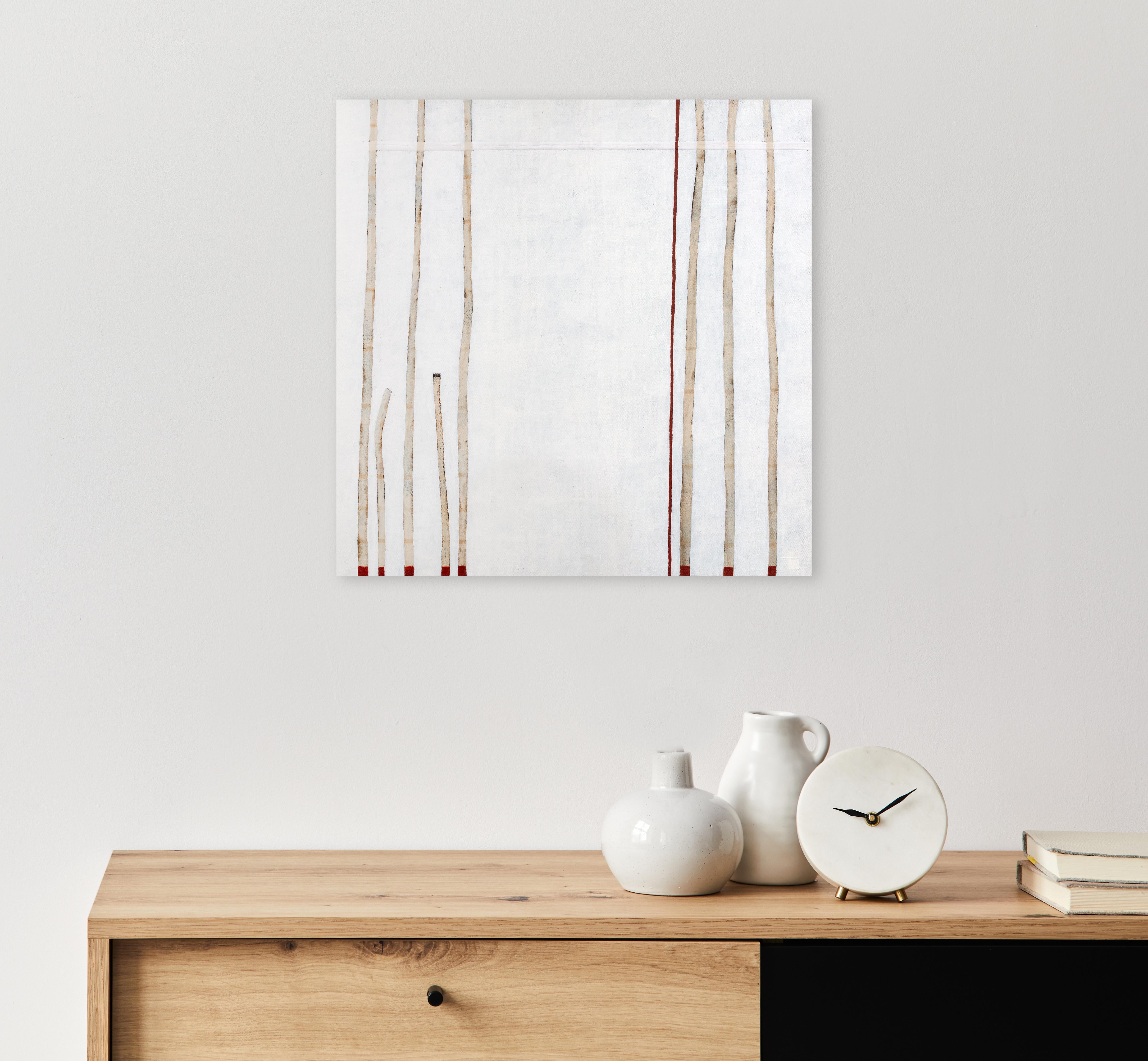 This abstract minimalistic painting by Sofie Swann features a warm neutral palette. In it, organic, imperfect light beige rectangles extend up from smaller, deep red squares at the bottom of the composition. They reach the top toward the top of the