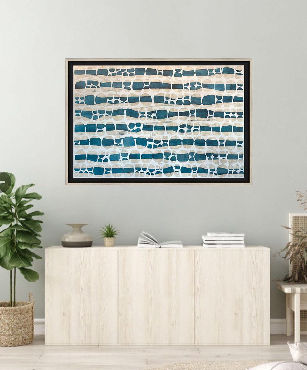 This Limited-Edition abstract print, by Sofie Swann is an edition of 95. Printed on canvas, this giclee ships framed in a white floater frame wired and ready to hang. Other floater frame options are available in silver, black, gold, and walnut. For