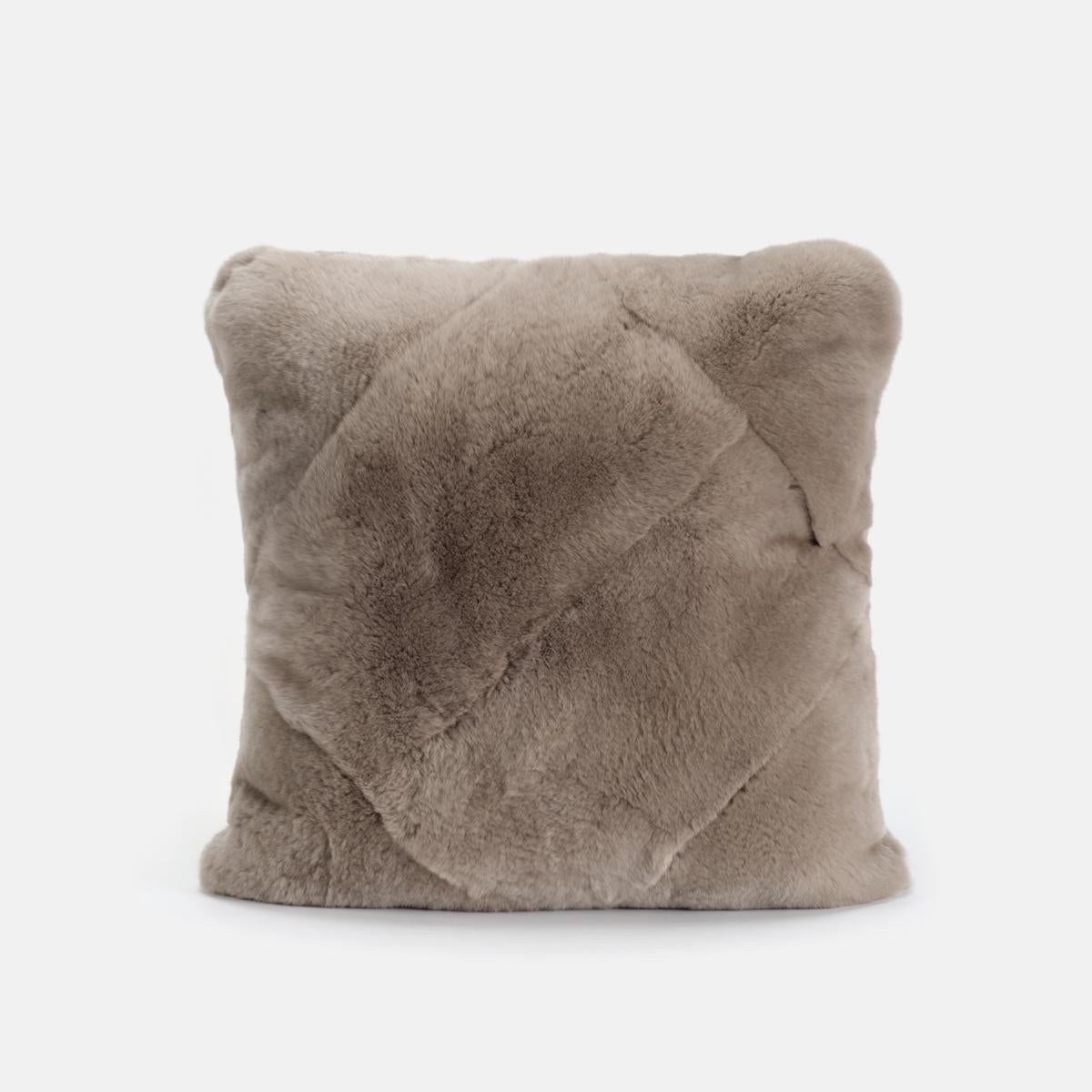 A plain Superior Lapin fur cushion that fits in every room. Using a multitude of these pillow in different shades of colors can really make your sofa pop out of the living room with the color accent you like the most.

The craftsmanship requires a