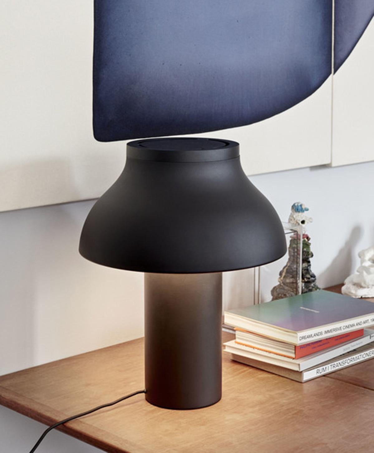 Pierre Charpin’s PC table lamps is a refined freestanding tabletop lamps. The lamp is constructed in anodised aluminium, which makes the surface more resistant to corrosion. The light source is hidden from view by a removable polycarbonate moulded