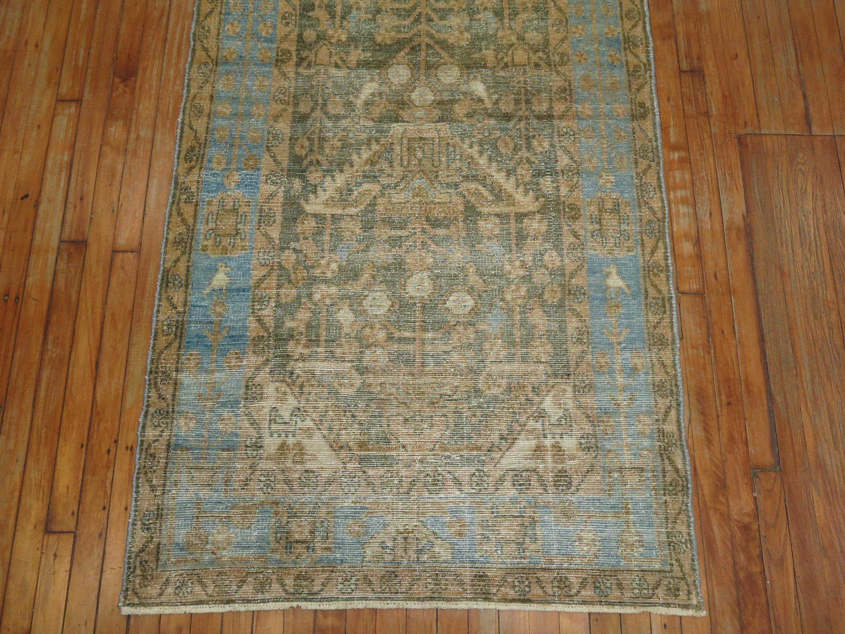 A shabby chic early 20th century Persian Malayer runner in cool earth tones.