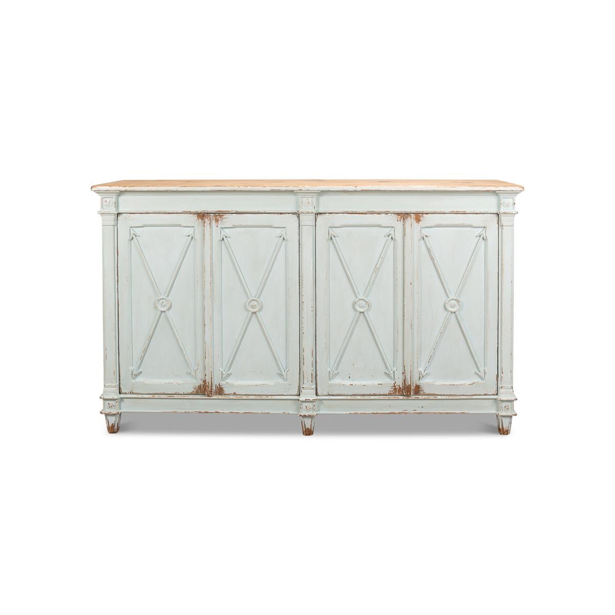 With an painted finish to the four-door cabinet and with a natural pine top. Each door has a cross arrow design. This piece is crafted in pine and has an antiqued rustic finish. The interior has two removable shelves.

Dimensions: 66