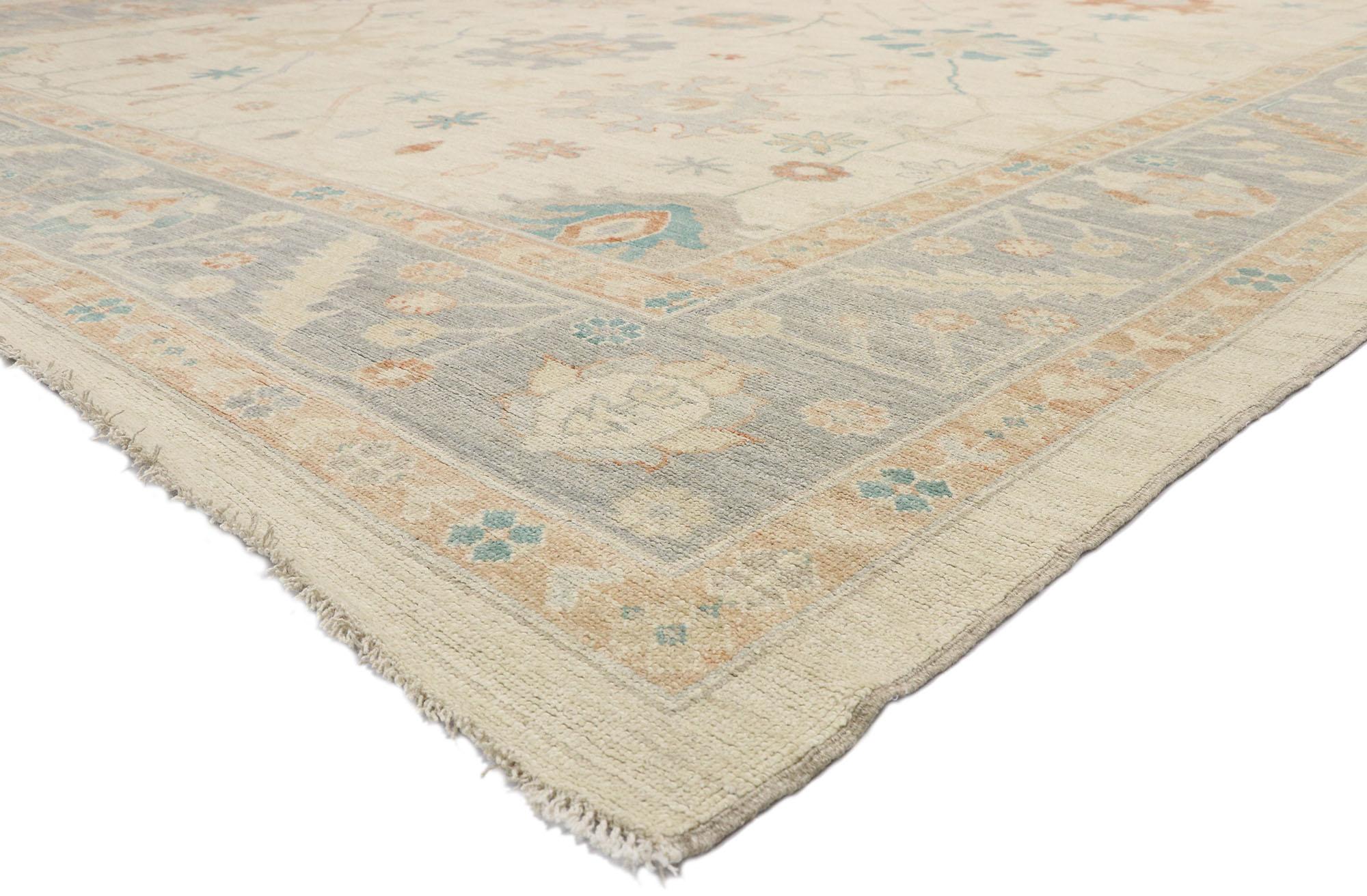 80557 New Soft Earth-Tone Oushak Rug, 12'00 x 15'00. With its light and airy colors combined with tranquil vibes, this hand-knotted wool Oushak transitional area rug creates an inimitable warmth and calming ambiance. It features an all-over