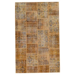 Tappeto in lana patchwork vintage dai toni morbidi dell'oro 5'x8'
