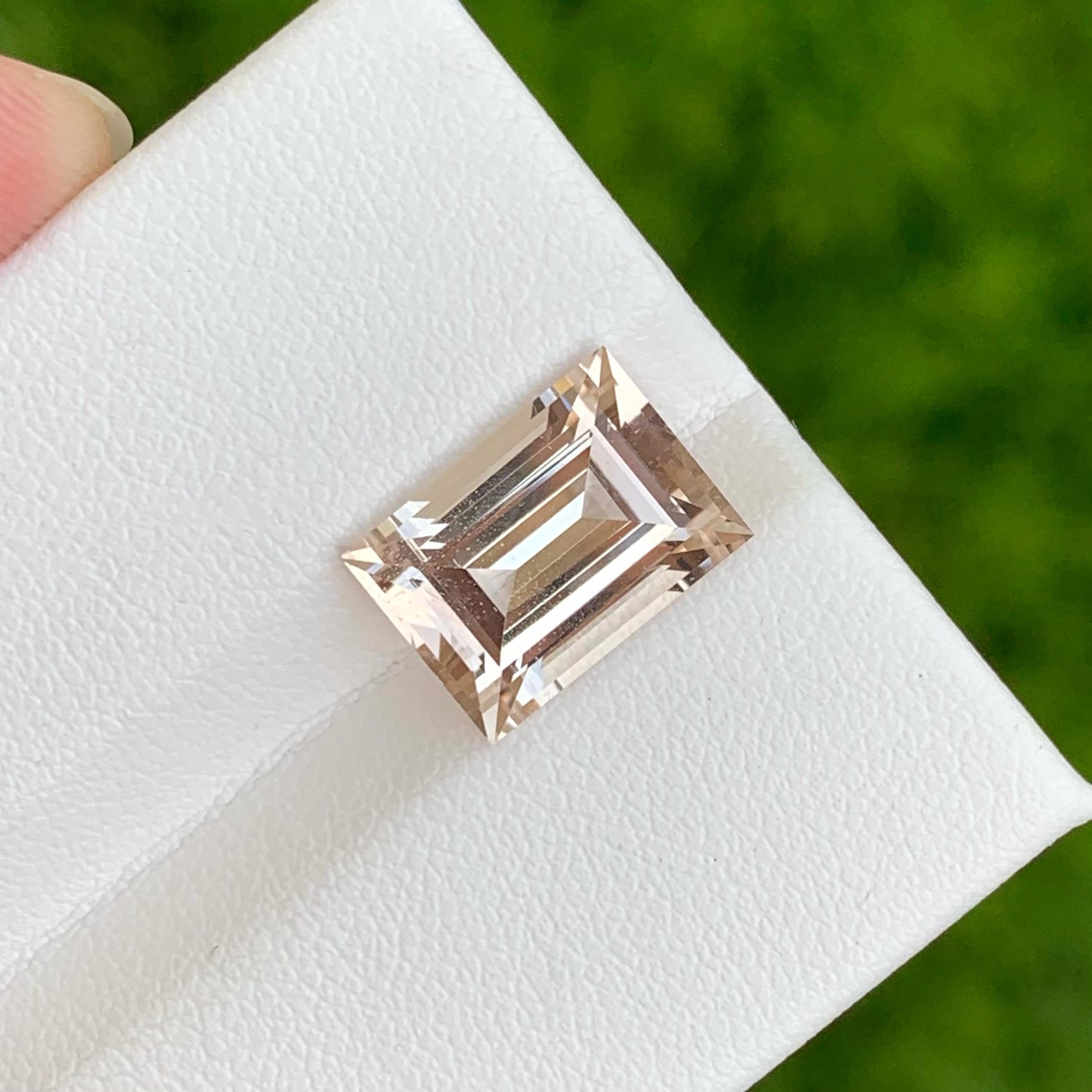 Weight 6.45 carats 
Dimensions 12.4x9.0x6.4 mm
Treatment none 
Origin Pakistan 
Clarity VVS ( Very, Very Slightly Included)
Shape Rectangular 
Cut Baguette

Indulge in the mesmerizing allure of soft golden color topaz gemstones. These exquisite