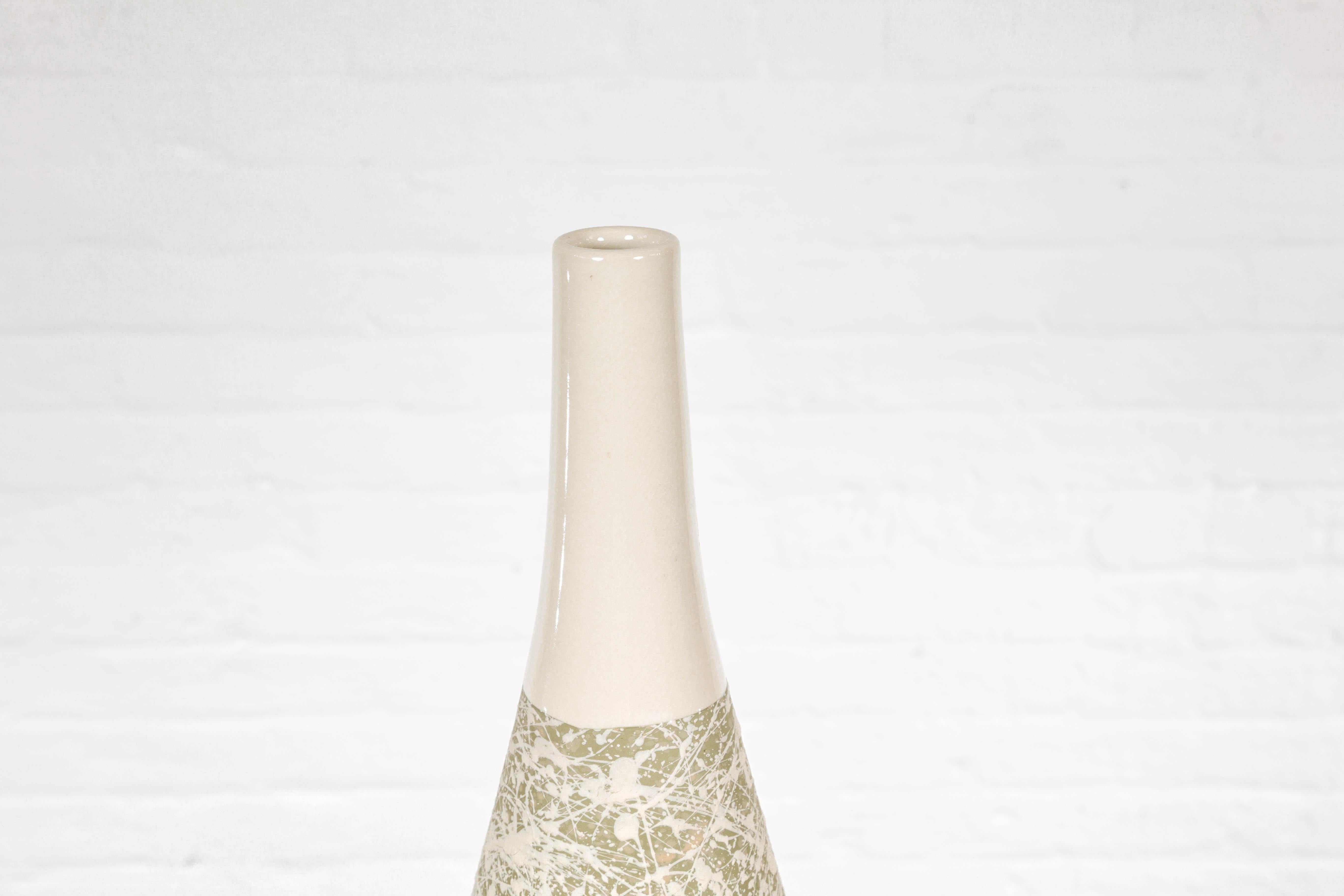 Contemporary Soft Green and Cream Artisan Ceramic Vase with Energetic Dripping Décor For Sale