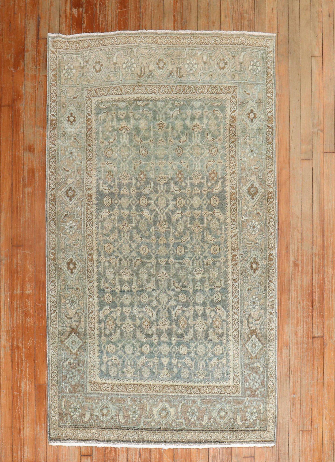 An accent size early 20th century Persian Malayer rug in green, khaki, and soft brown

Measures: 3'9