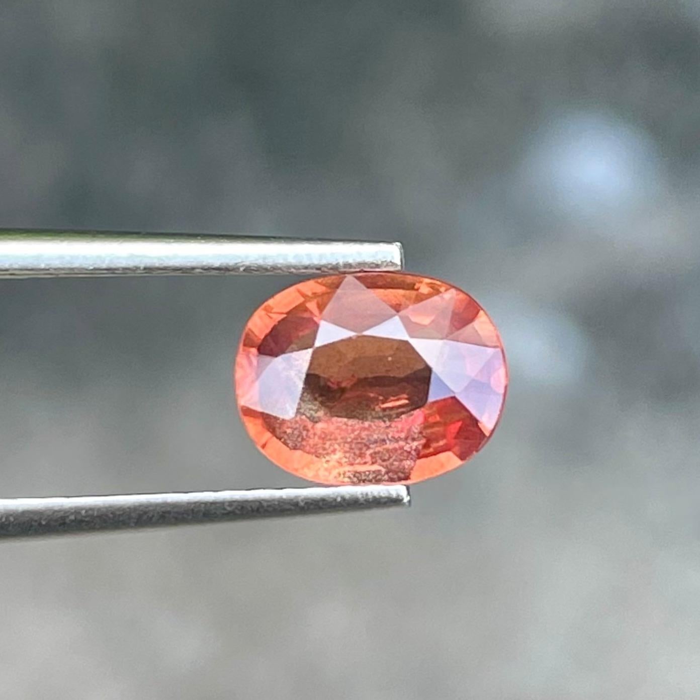 Modern Soft Orange Loose Sapphire 1.62 Carats Step Oval Cut Natural Sri Lankan Gemstone For Sale