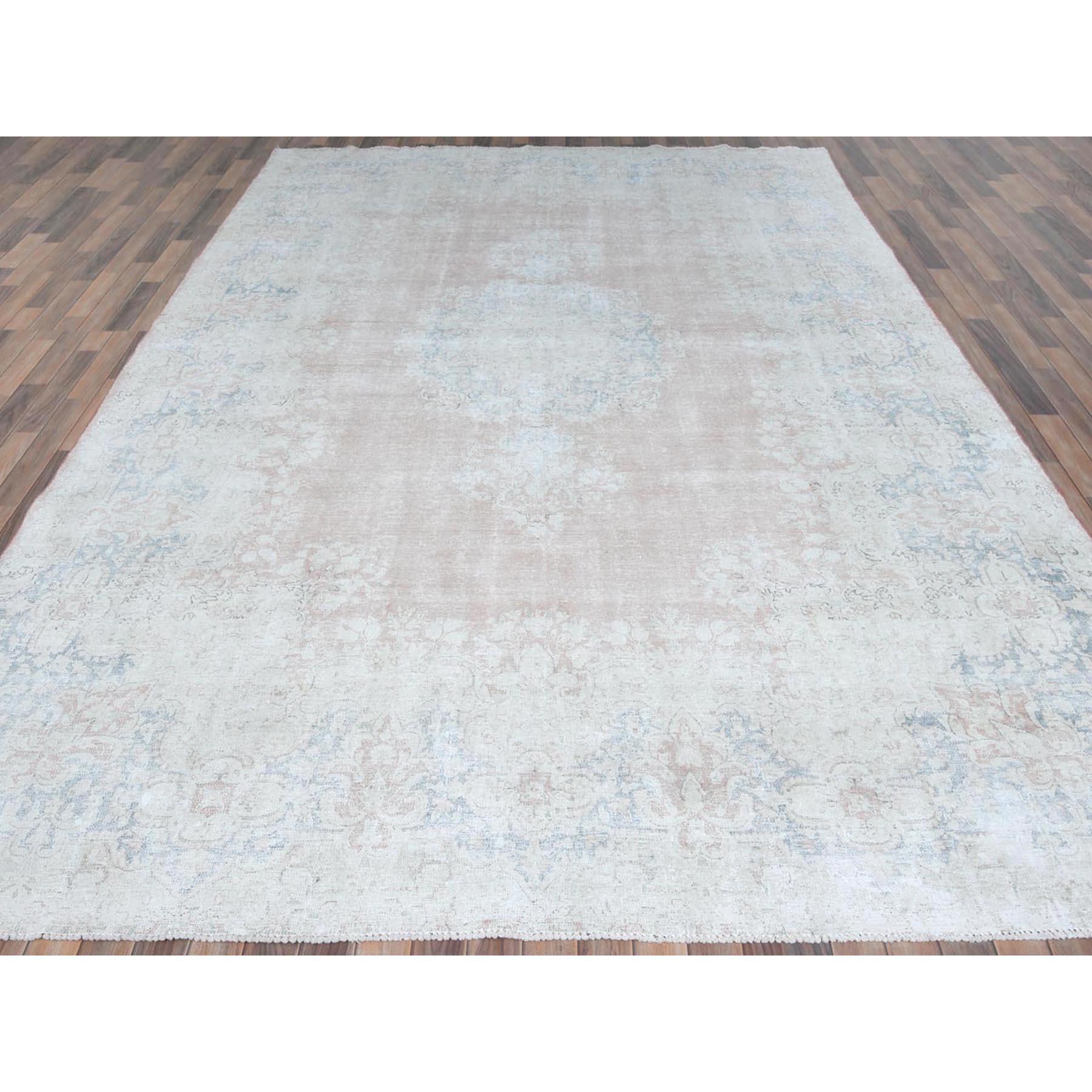 Medieval Soft Pink Hand Knotted Worn Wool Cropped Thin Distressed Old Persian Kerman Rug For Sale
