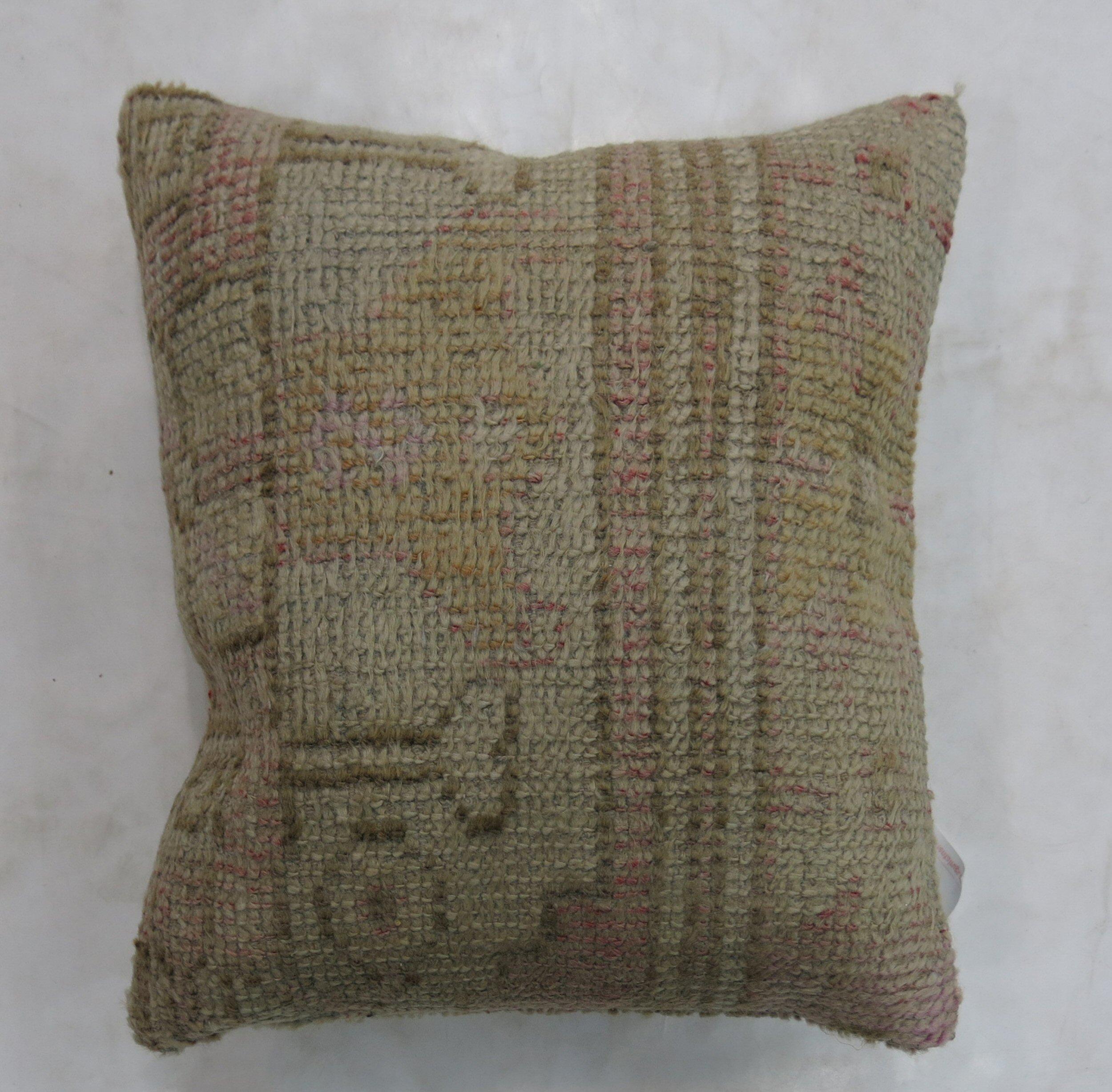 One of a Kind rug pillow made from a vintage Turkish Oushak with cotton back and zipper closure. Measures: 

16
