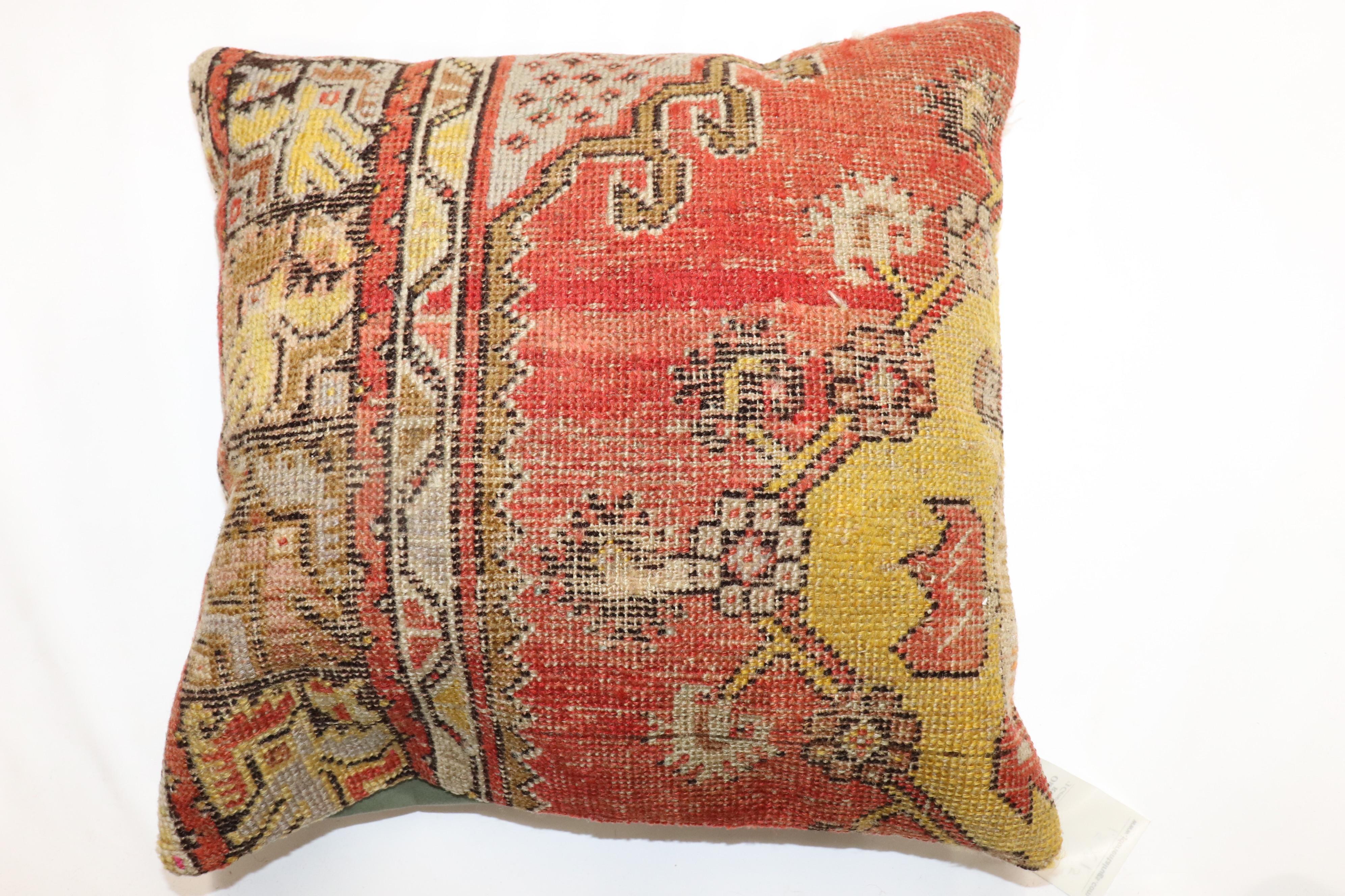 Pillow made from an early 20th century turkish rug. 

Measures: 17'' x 17''