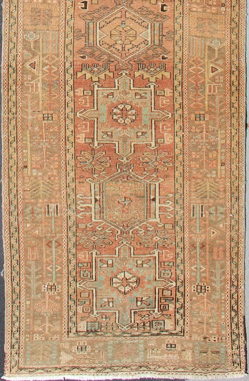 Multi-Medallion Persian Runner in Geometric Design, rug h-504-09, country of origin / type: Iran / Heriz, circa 1950

This vintage Persian Heriz runner features a classic multi-medallion design. The vertical arrangement of medallions is framed by a