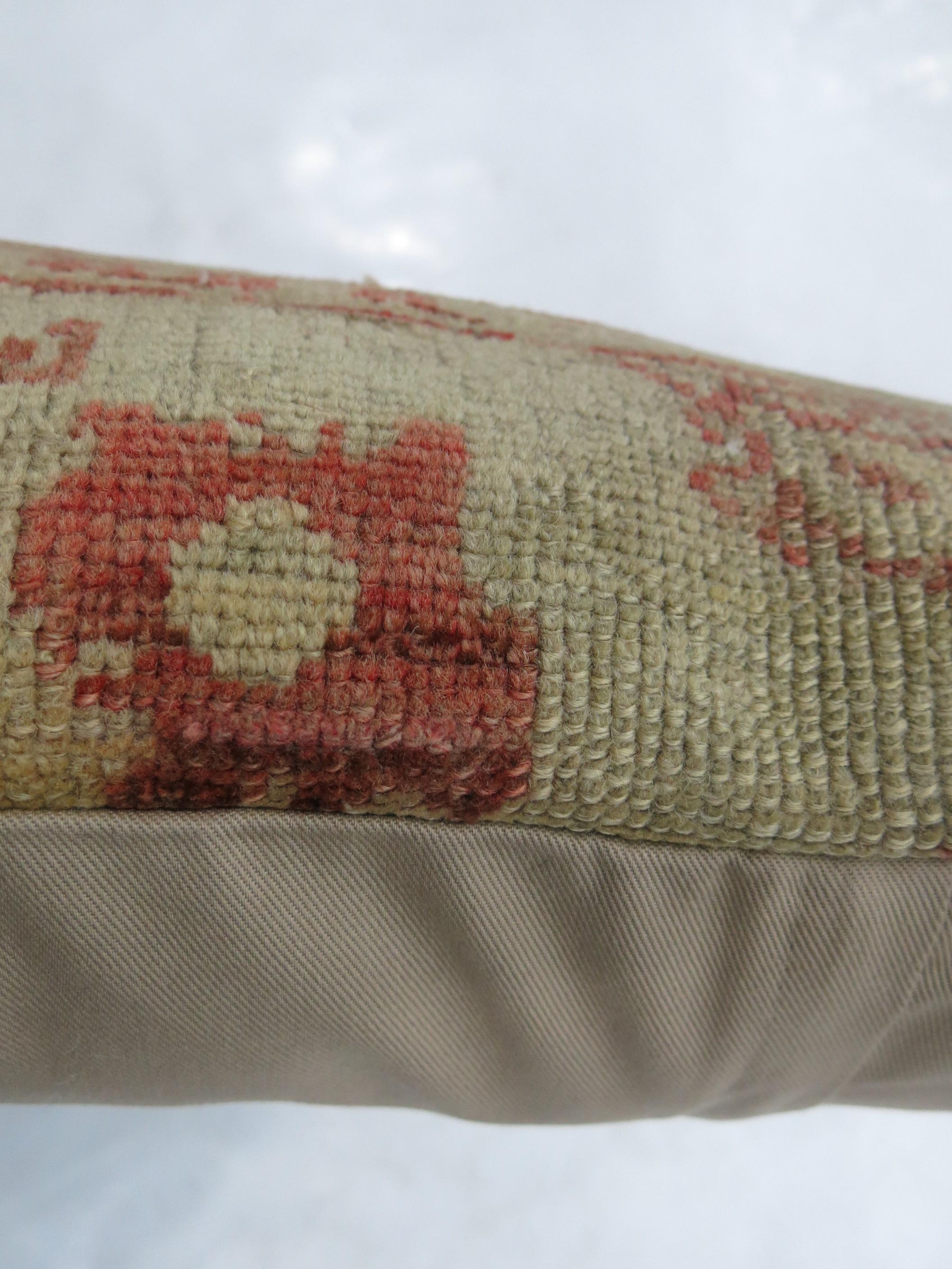 Pillow made from a Turkish Oushak rug.
