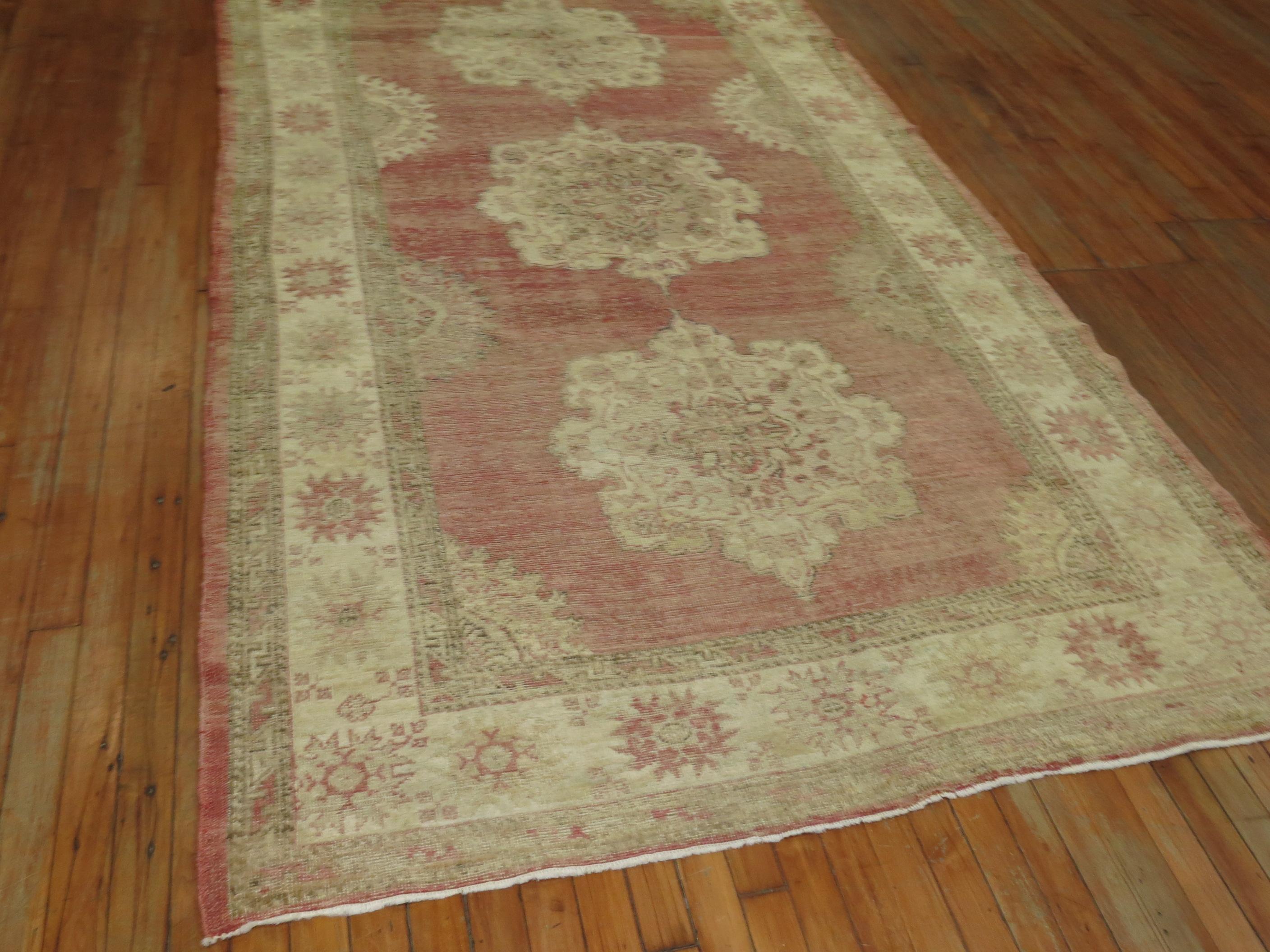 Hand-Knotted Soft Red Vintage Turkish Oushak Gallery Size Rug For Sale